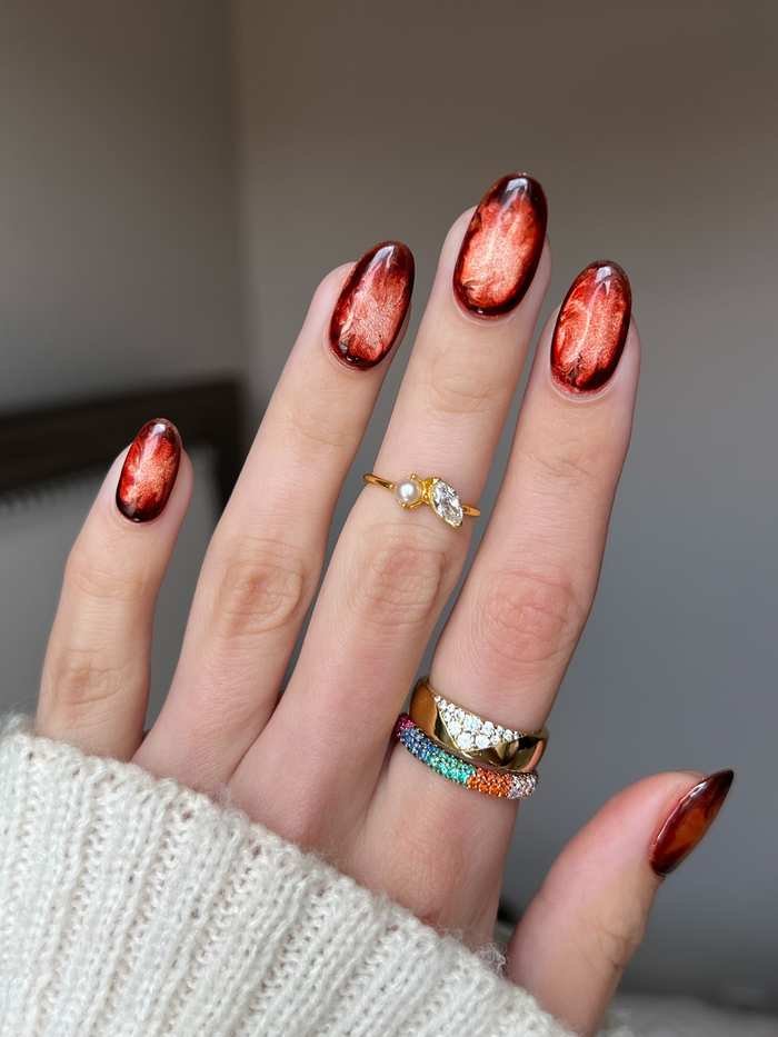 Short Oval Nails with Burnt Red and Black French Tips