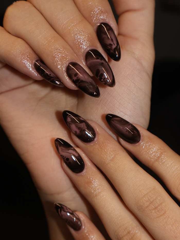 Dark Brown Almond Nails with Glossy Abstract Details