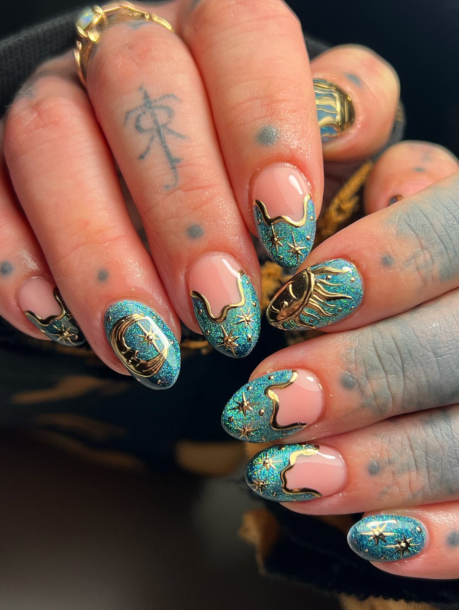 Turquoise Nails with Gold Celestial Details — DYy_zs0I52MRebecca - Droitwich Nail Artist.jpg