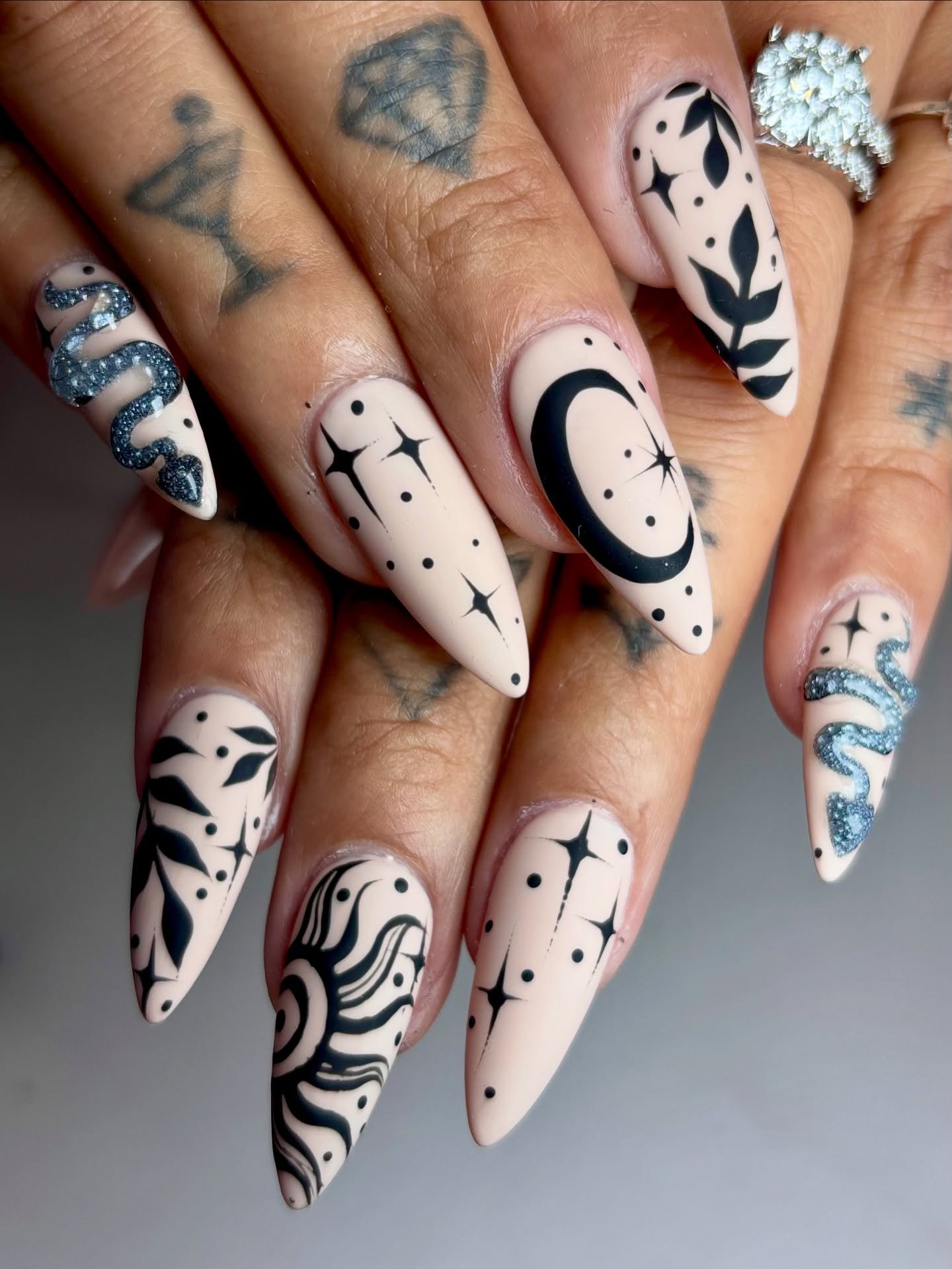 White Almond Nails with Black Celestial Illustrations — DM3N_XjPp7lJas.jpg