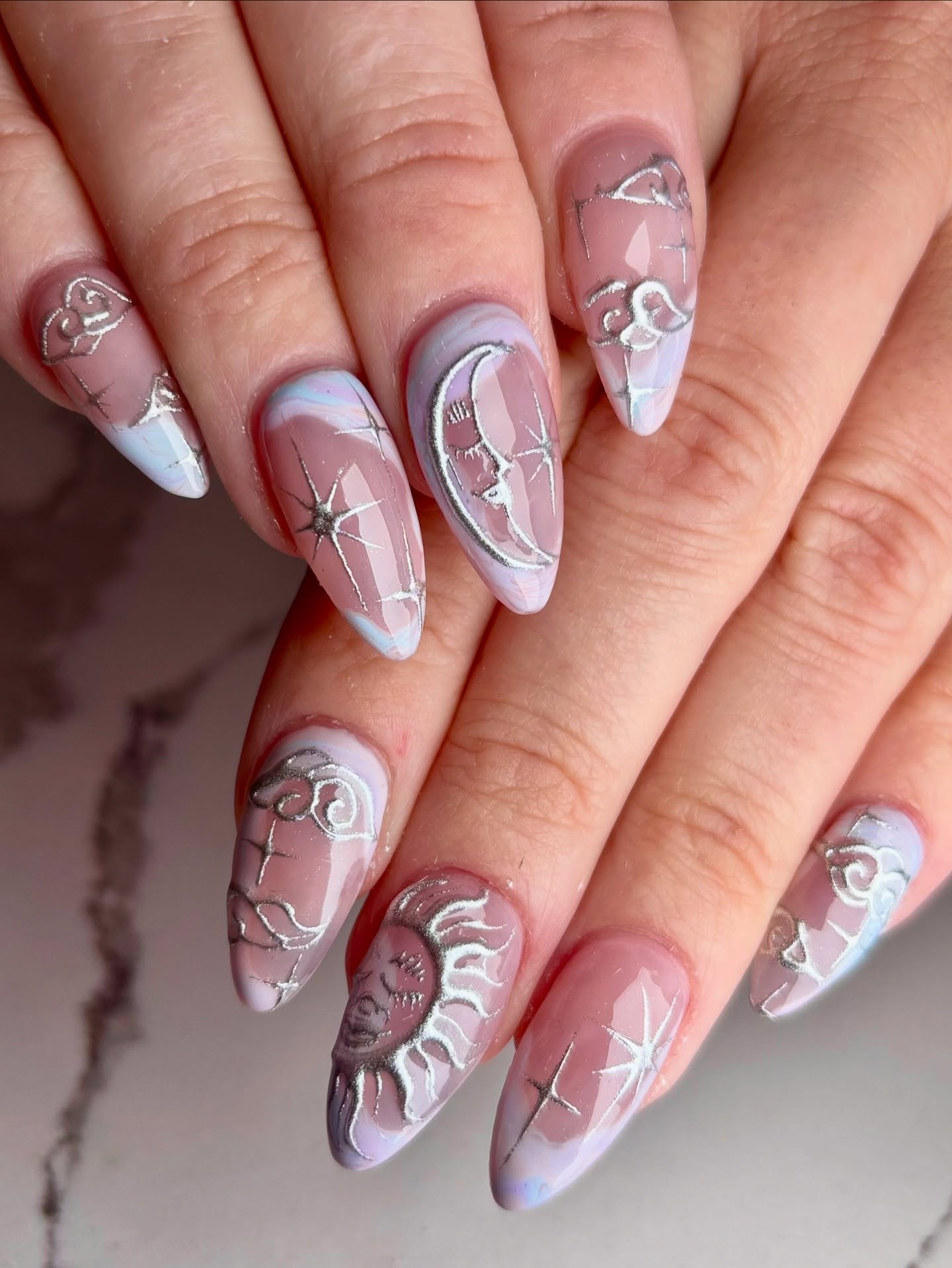 Sheer Pink Almond Nails with Silver and White Accents — DNJrHI8SKE_Jas.jpg