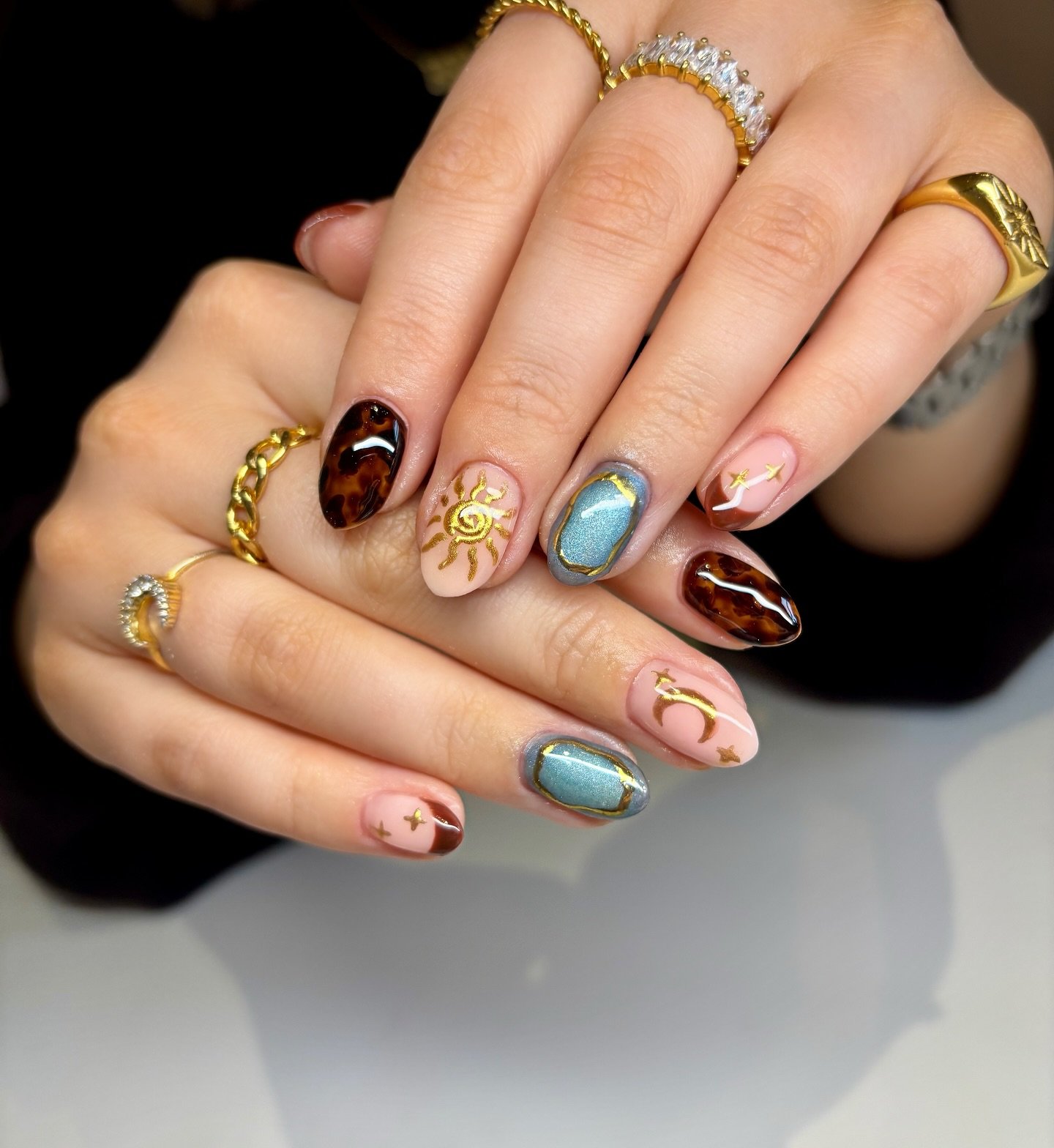 Mixed Nude and Blue Nails with Gold Celestial Accents — DPUWWTiCN8INikkis Nails London Nail Artist.jpg