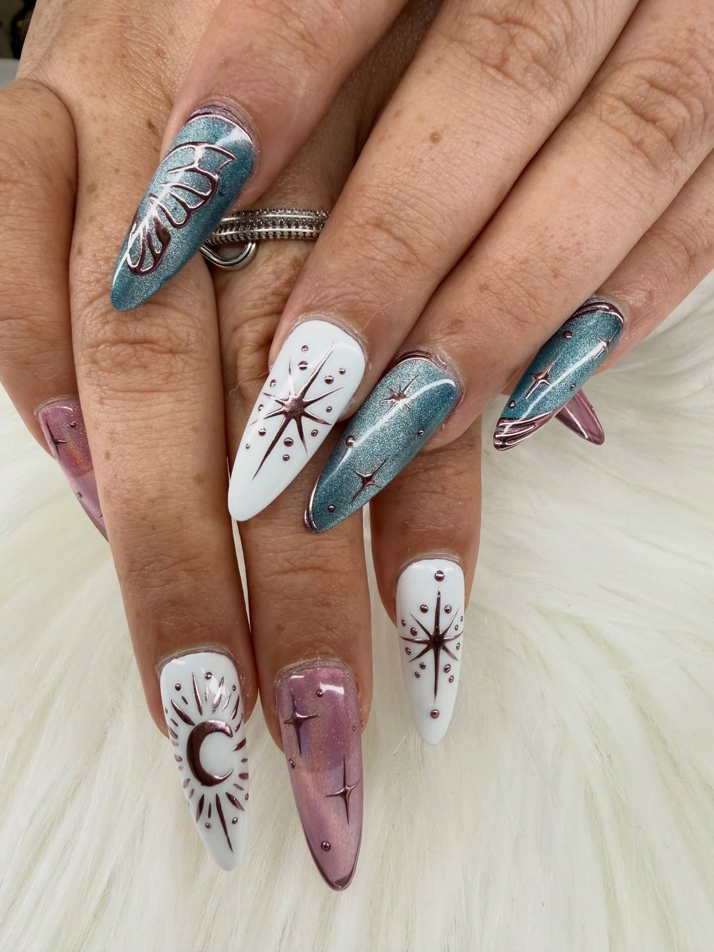 White and Blue Almond Nails with Black Celestial Graphics — DQILzy9Els6River Nail Spa.jpg