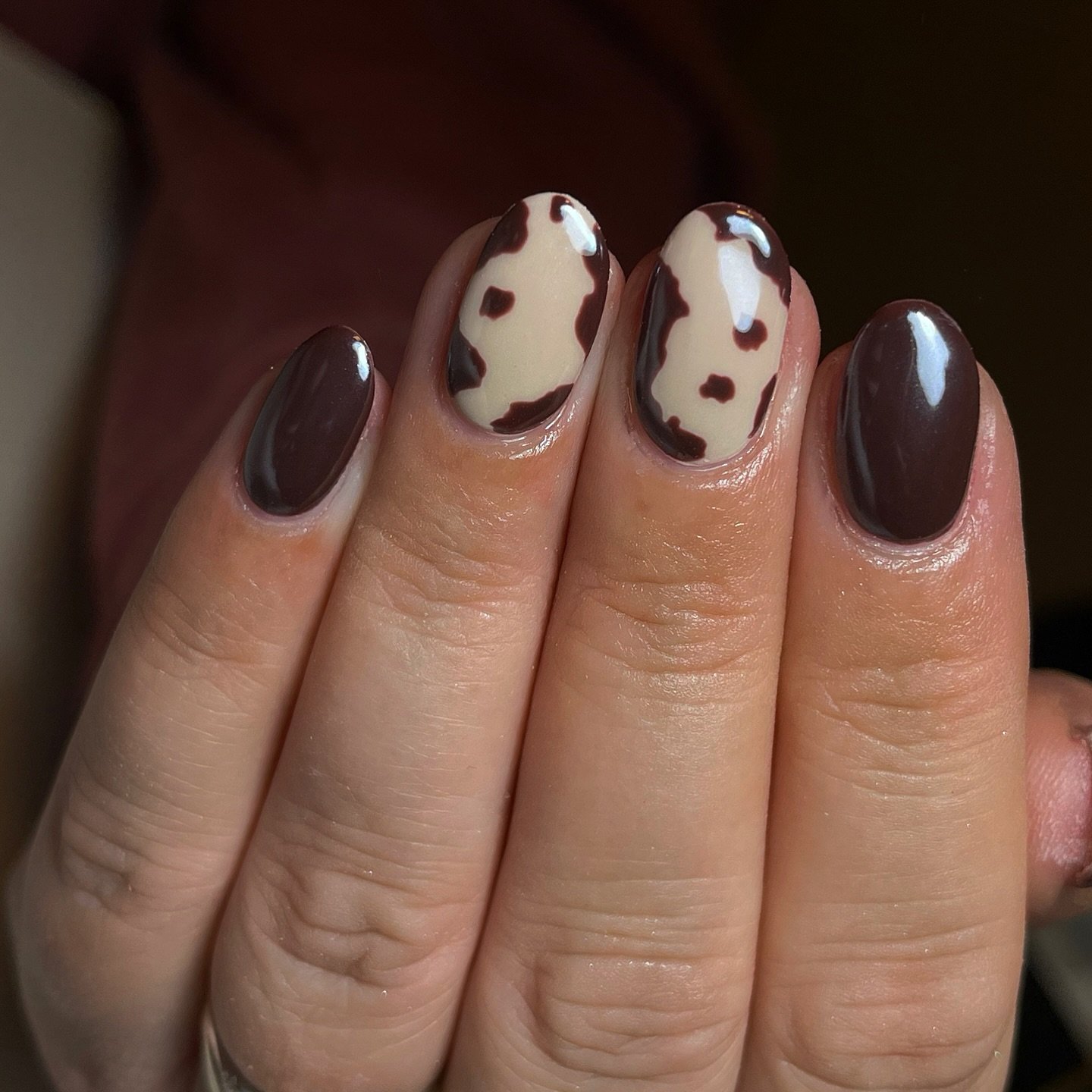 Short Rounded Cow-Print Chocolate Chrome Nails