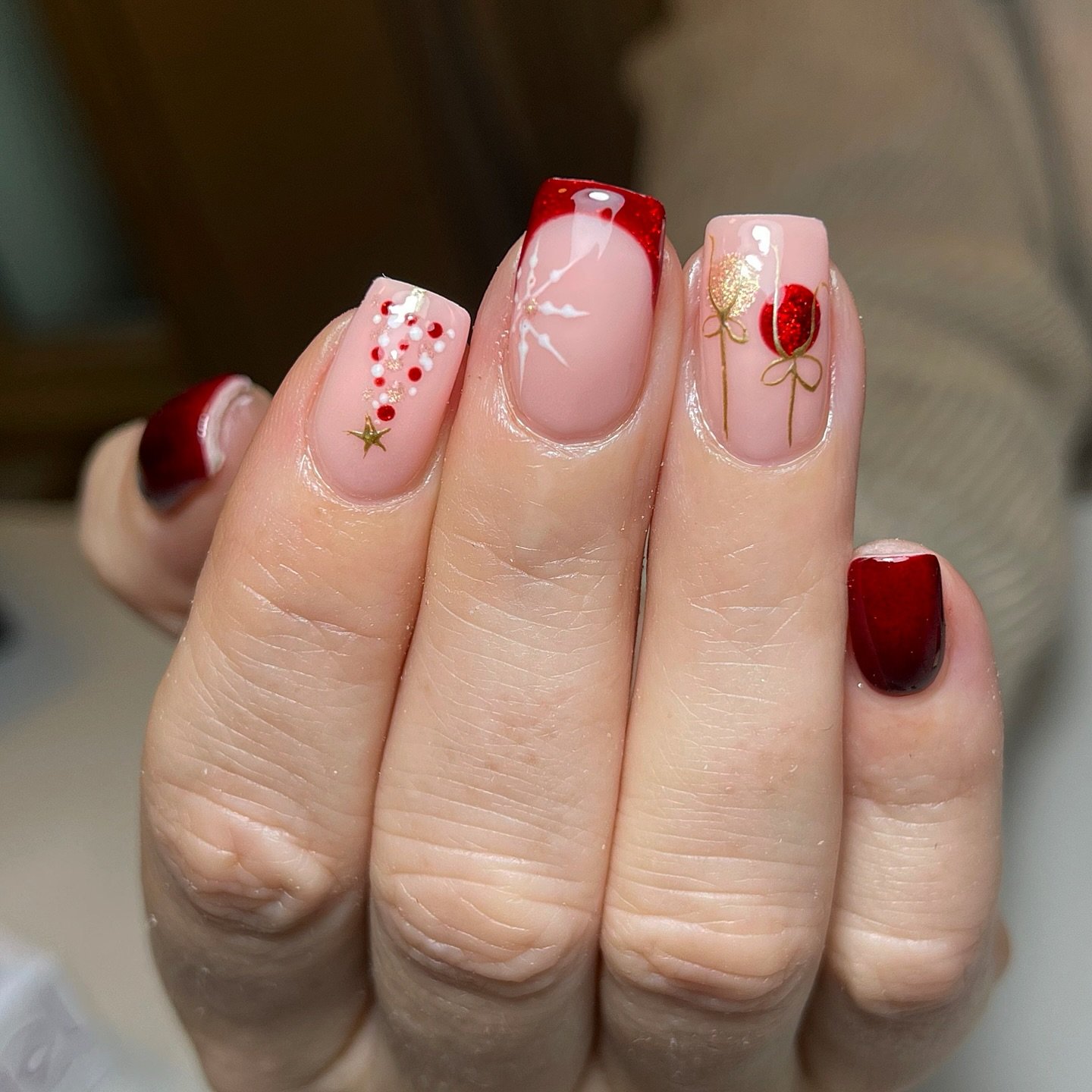 Short Nude Nails with Red Tips, Ornament and Bow Details