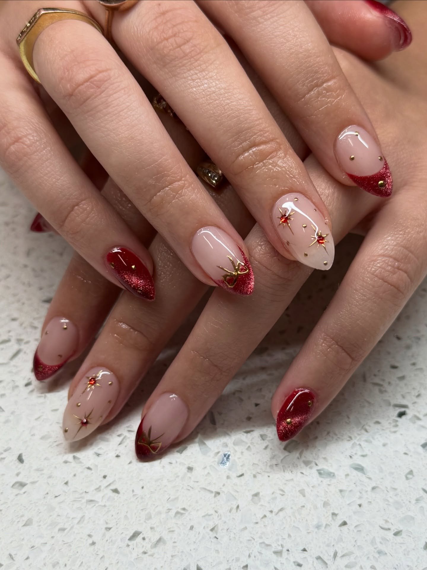 Nude and Red Almond Nails with Fine Christmas Line Art