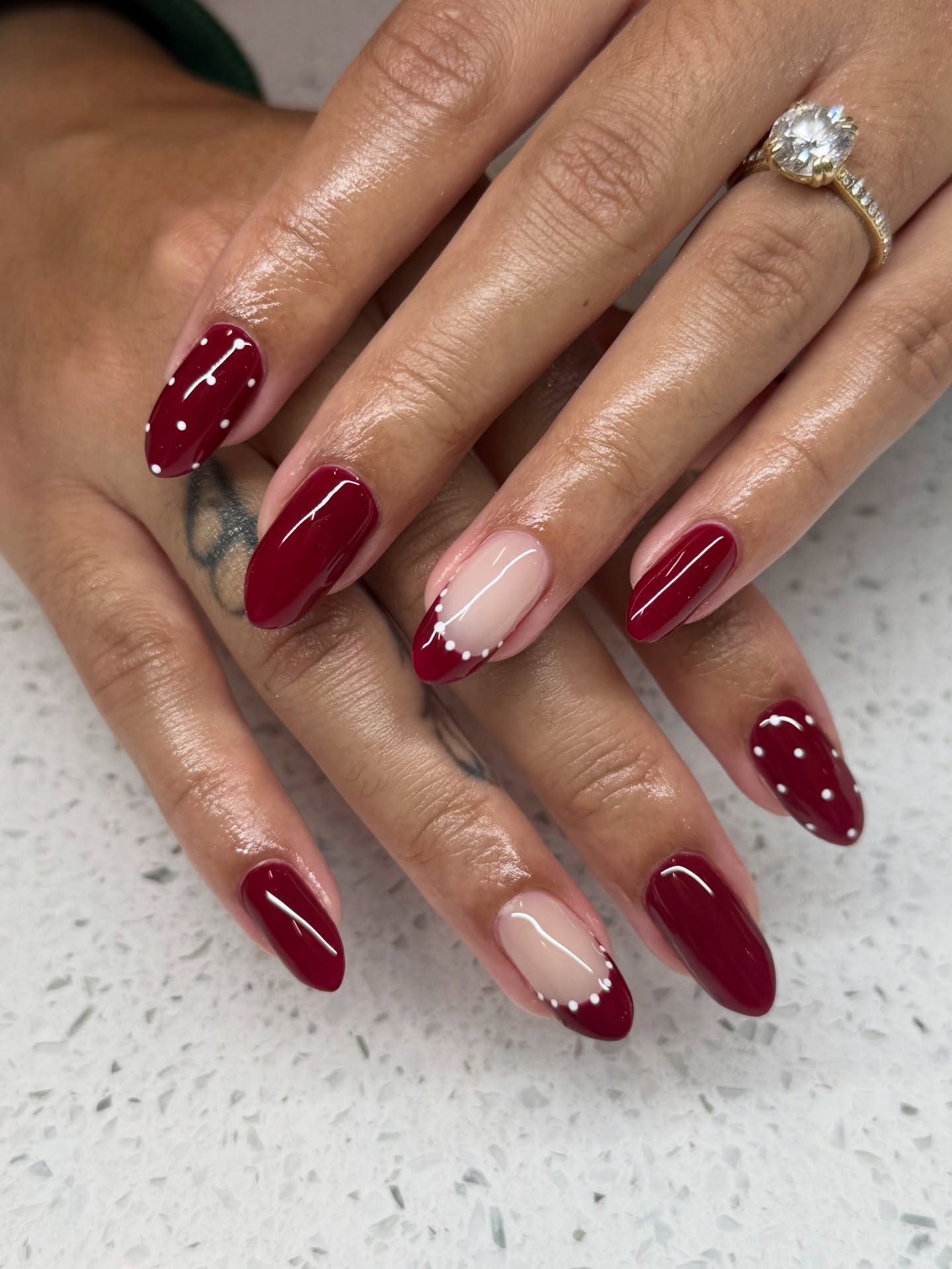 Deep Red and Nude Almond Nails with Glitter Accents