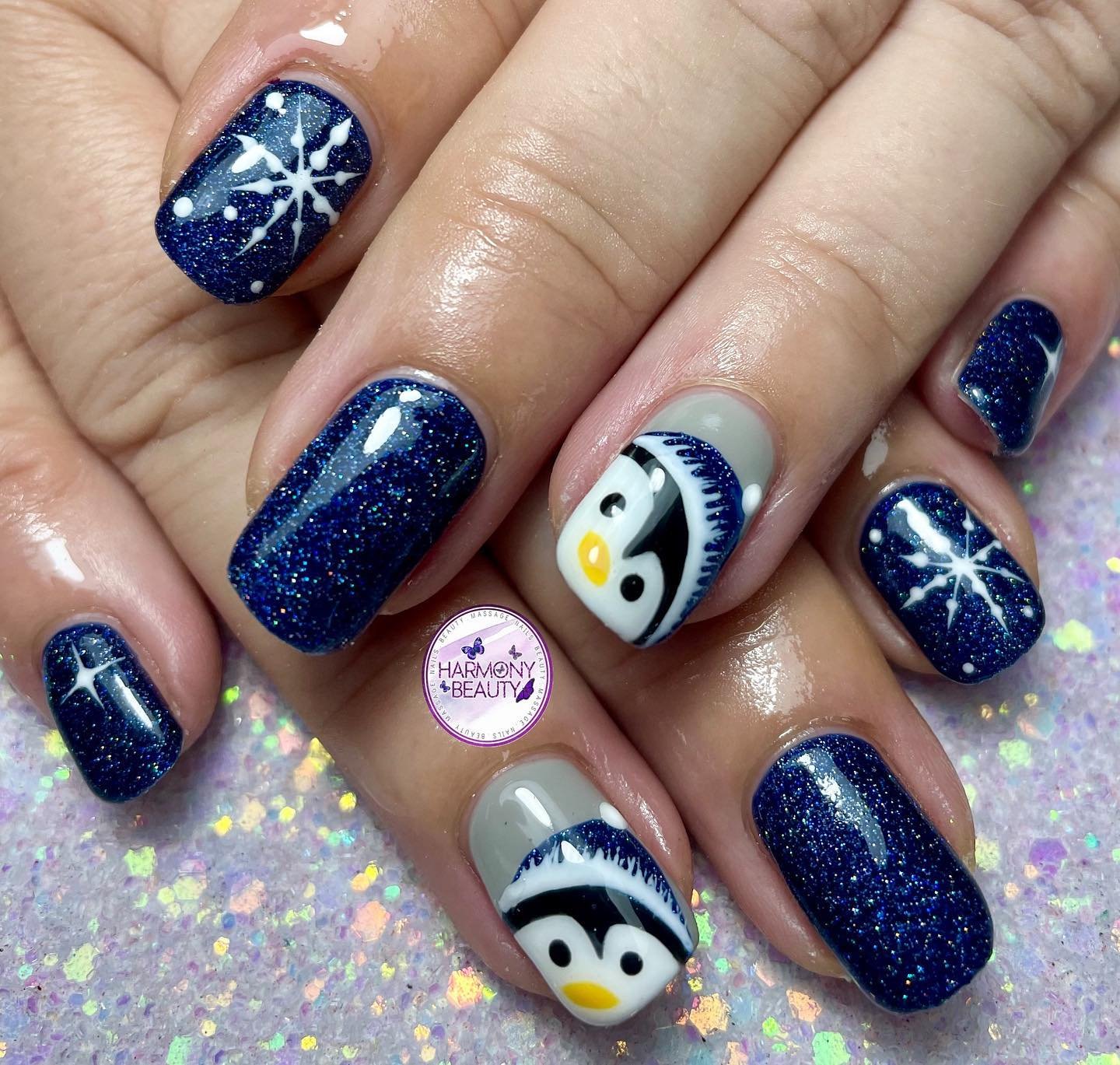 Navy Blue Glitter Nails with Snowflakes and Winter Character Art
