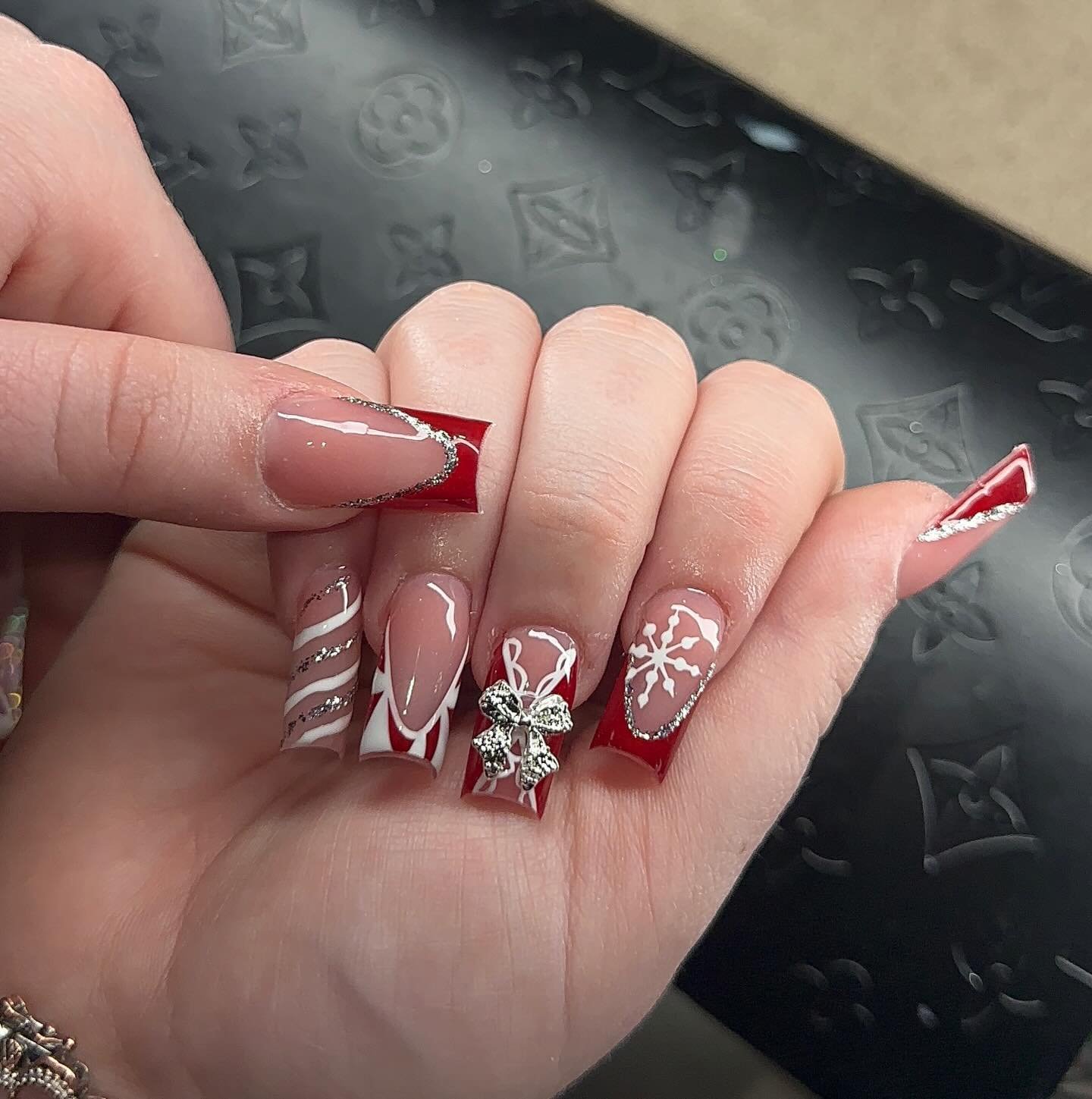 Nude and White Christmas Nails with Gingerbread and Candy Details