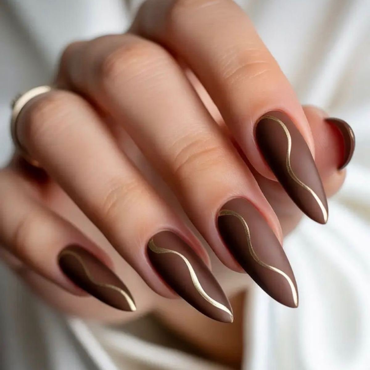 Deep Cinnamon Brown Almond Nails with Reflective Curves