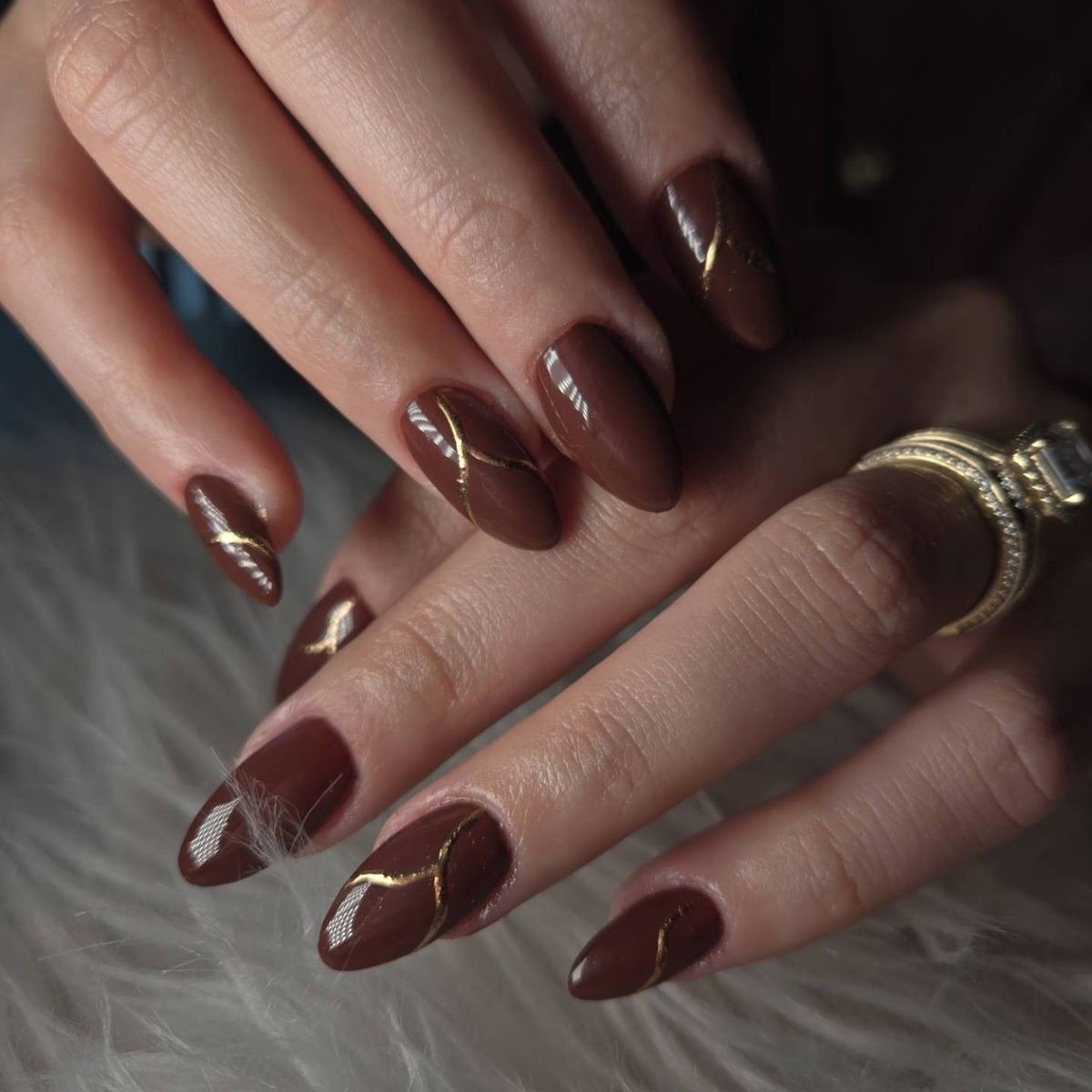 Dark Brown Almond Nails with Minimal Nude Accents