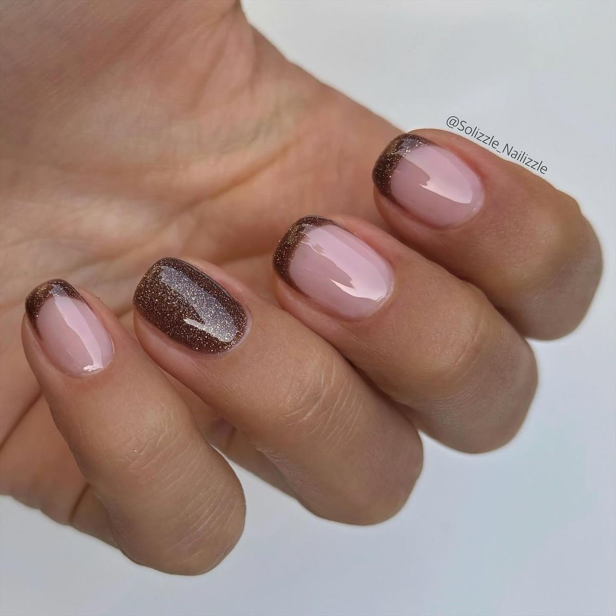 Short Pink Nails with a Brown Accent