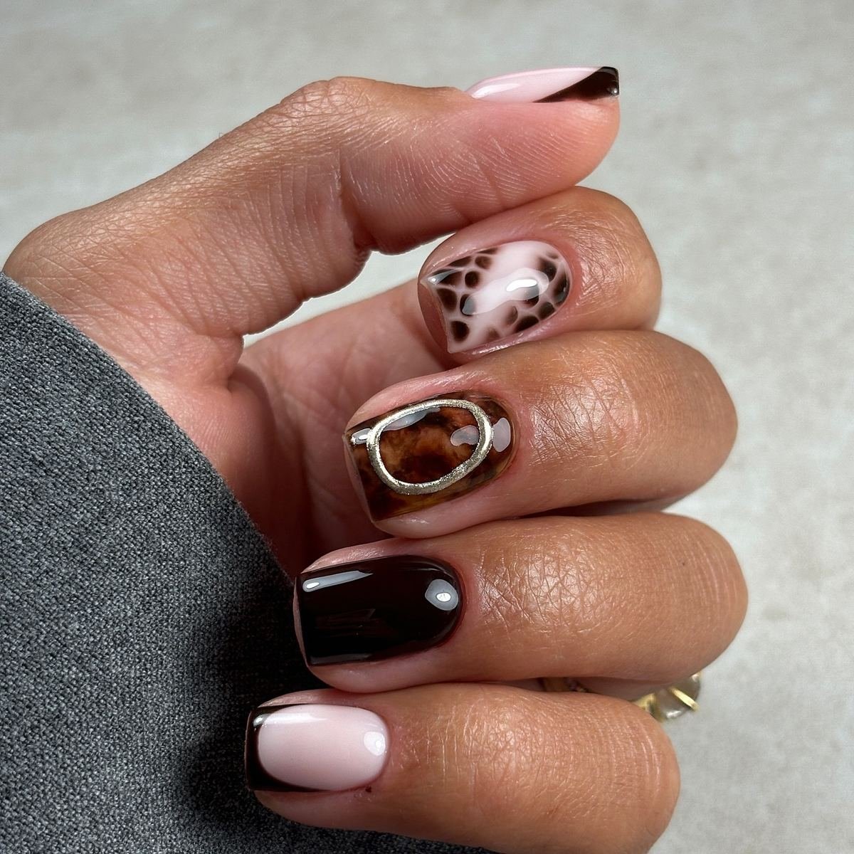 Brown and Nude Nails with Animal Print Accents