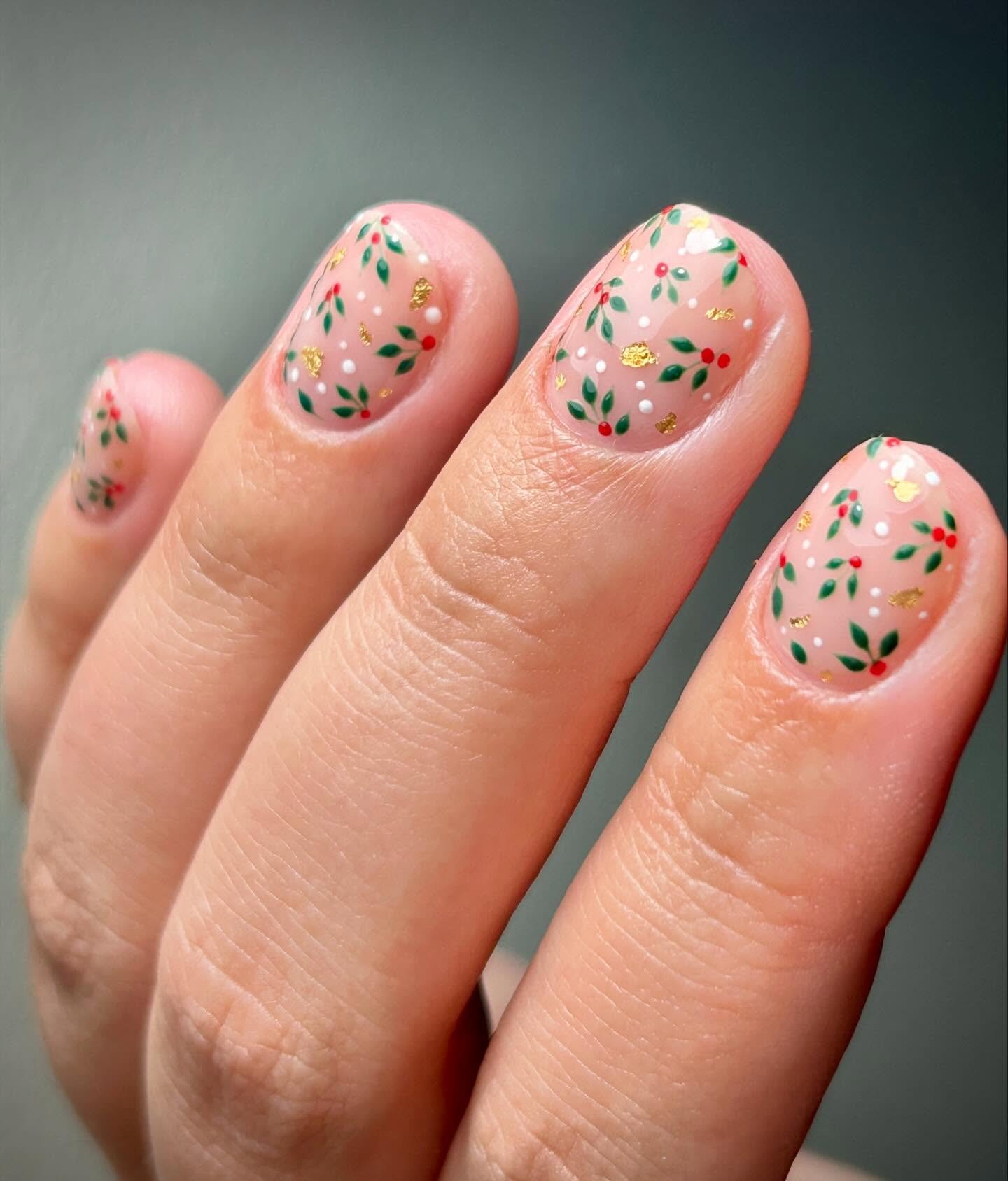 Short Pink Nails with Tiny Red and Green Holiday Sprigs
