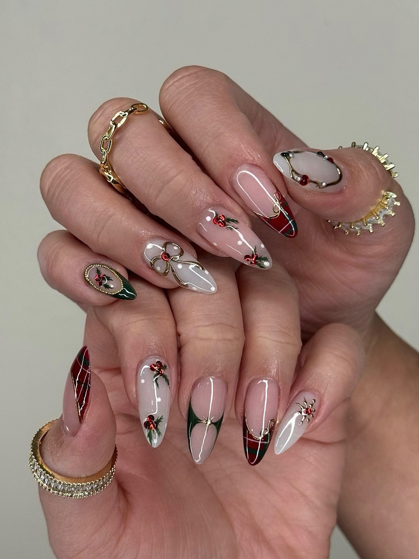 Long Stiletto Nails with Delicate Line Art and Crystal Accents