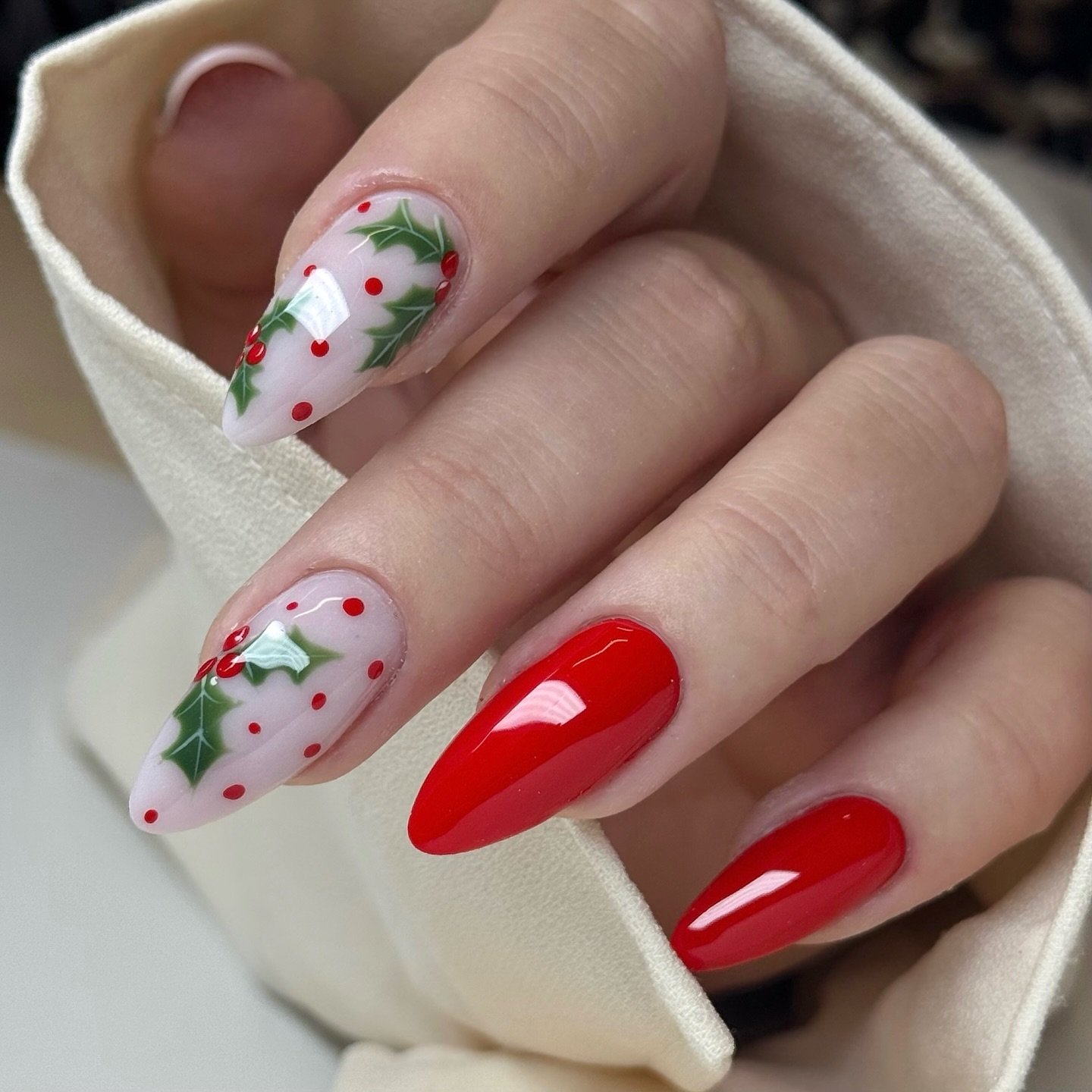 Red Glossy Nails with White, Green, and Holiday Candy Details