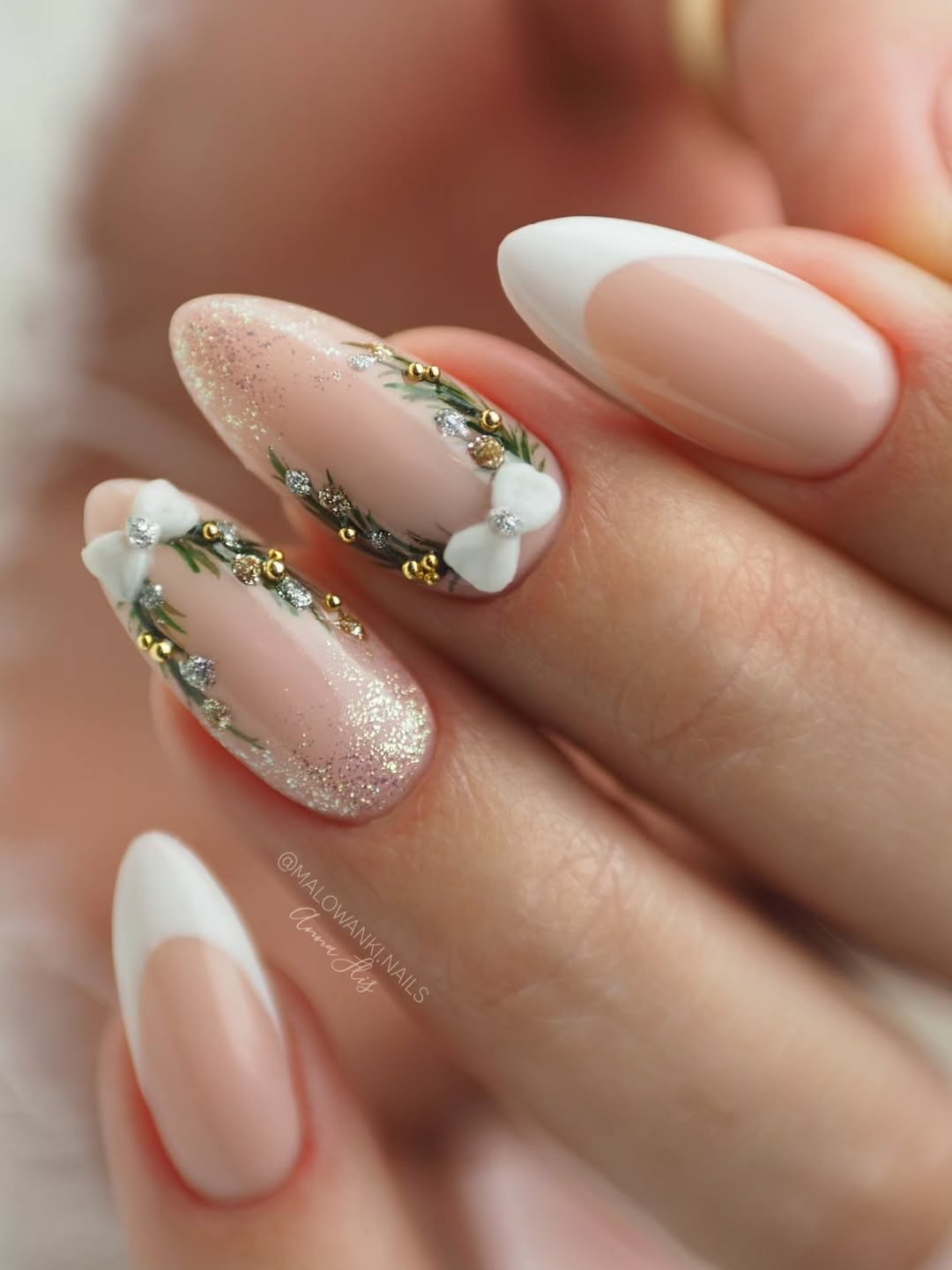 Sheer Pink Nails with White French Tips and Gold Glitter Accents