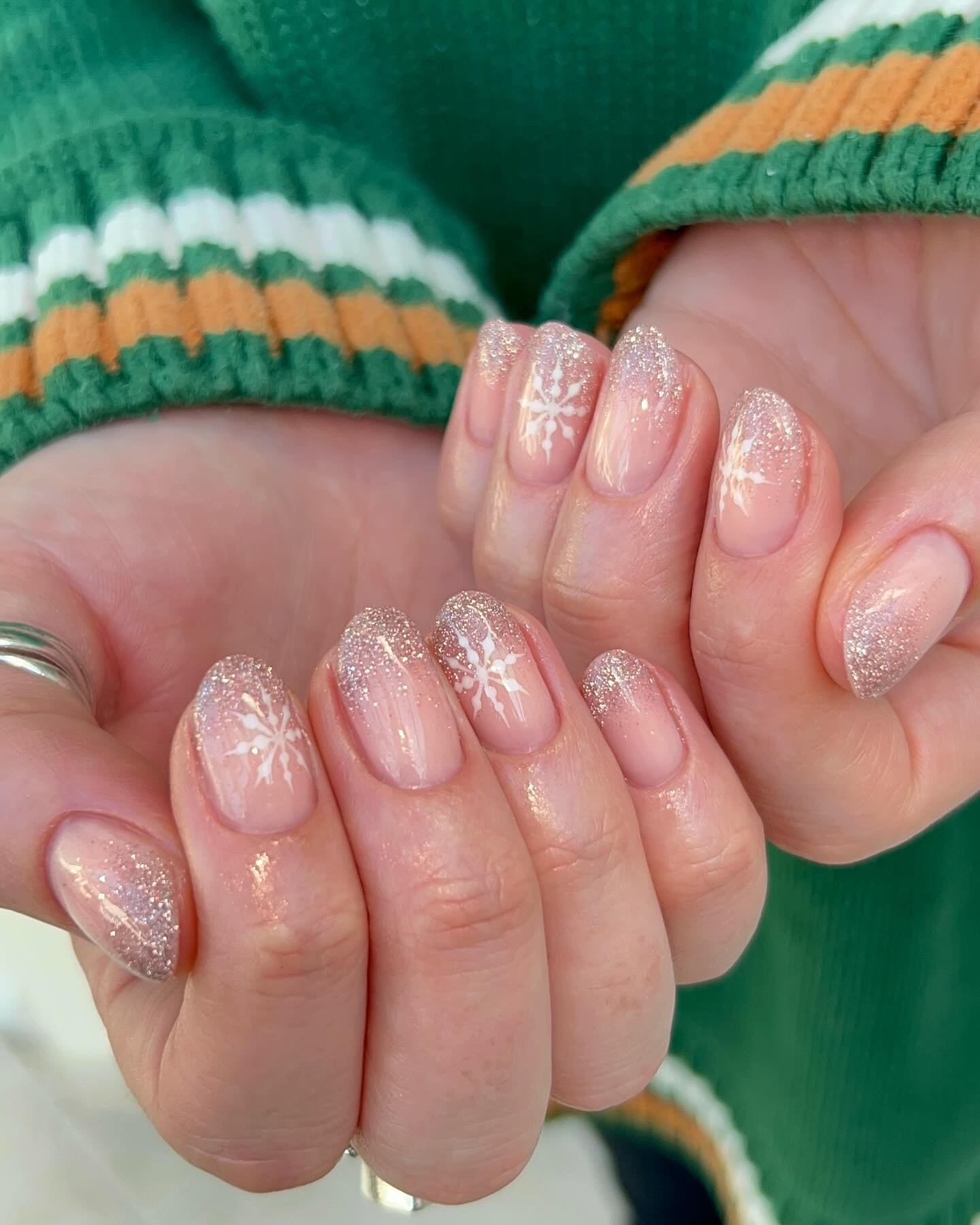 Short Rounded Pink Nails with Fine Glitter Shimmer