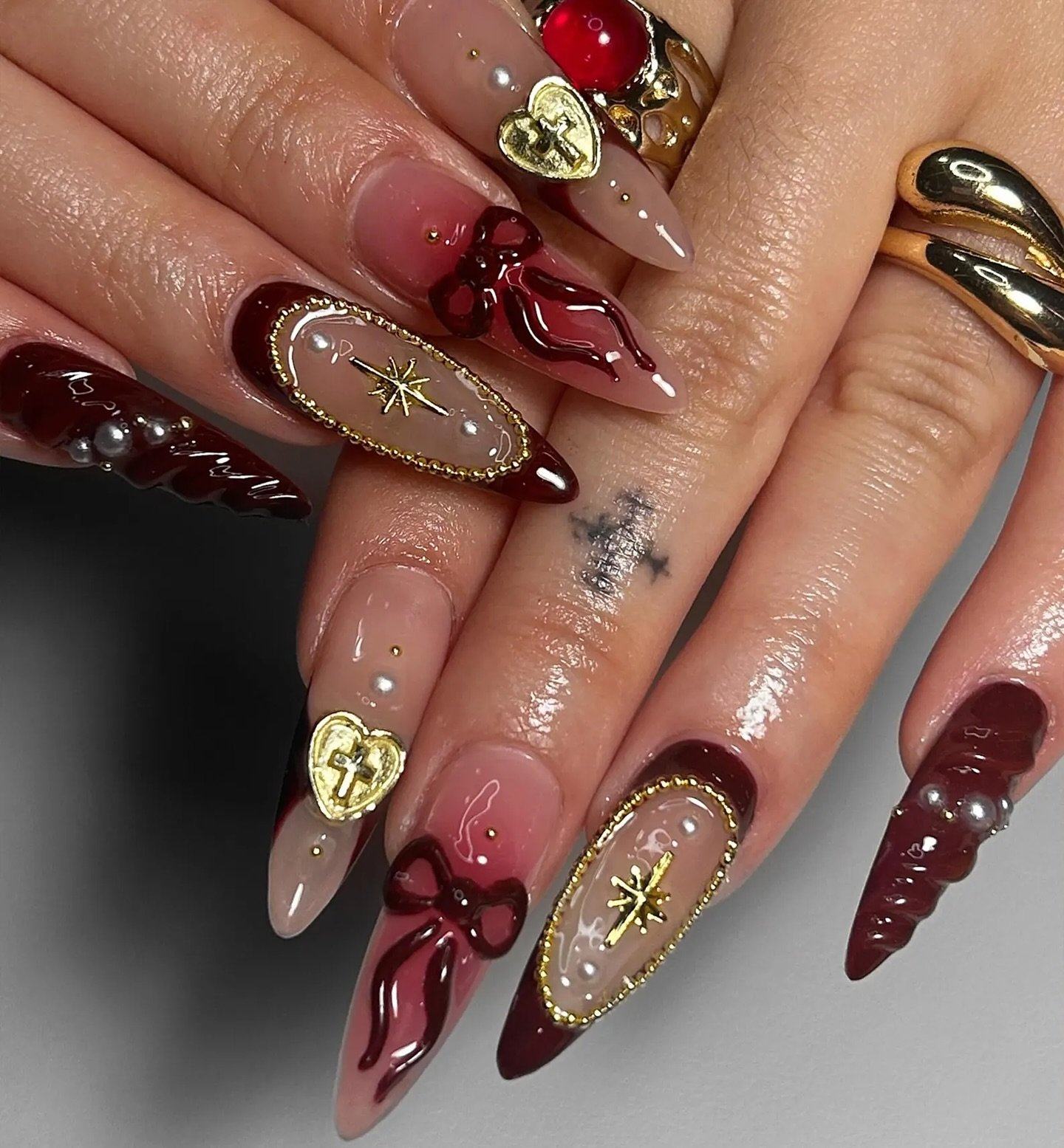 Green and Red Christmas Nails with a White Holly Accent