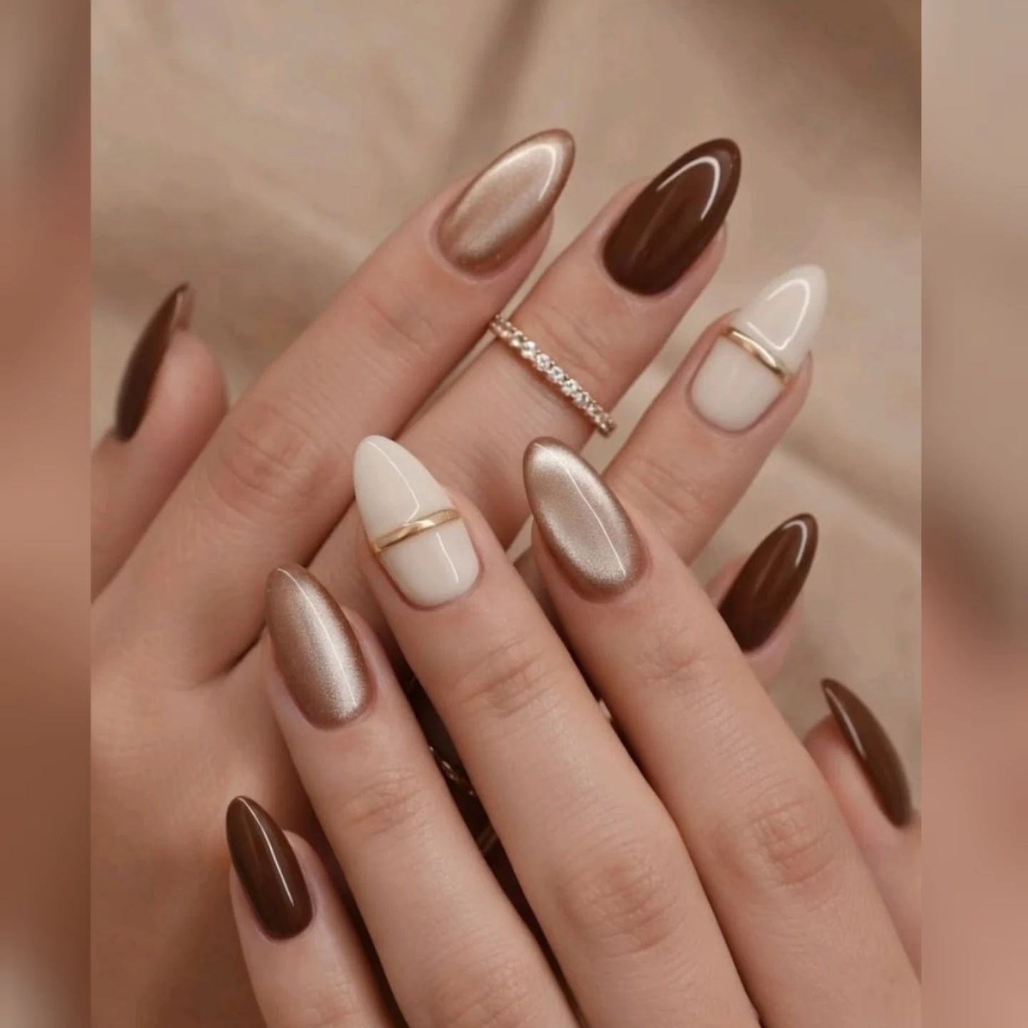 Mocha and Cream Almond Nails with Swirled Accents