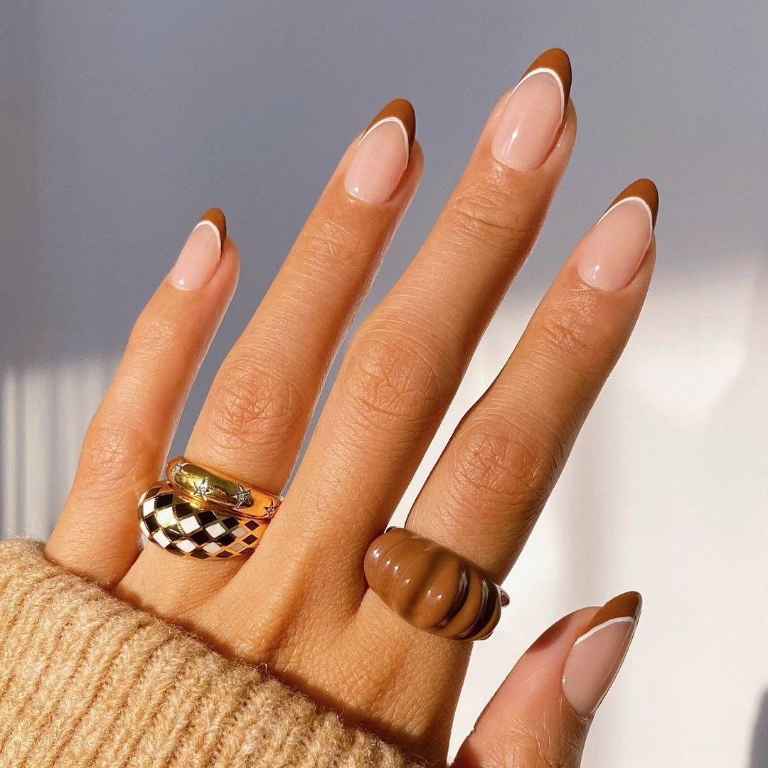 Warm Nude Almond Nails with Brown French Tips