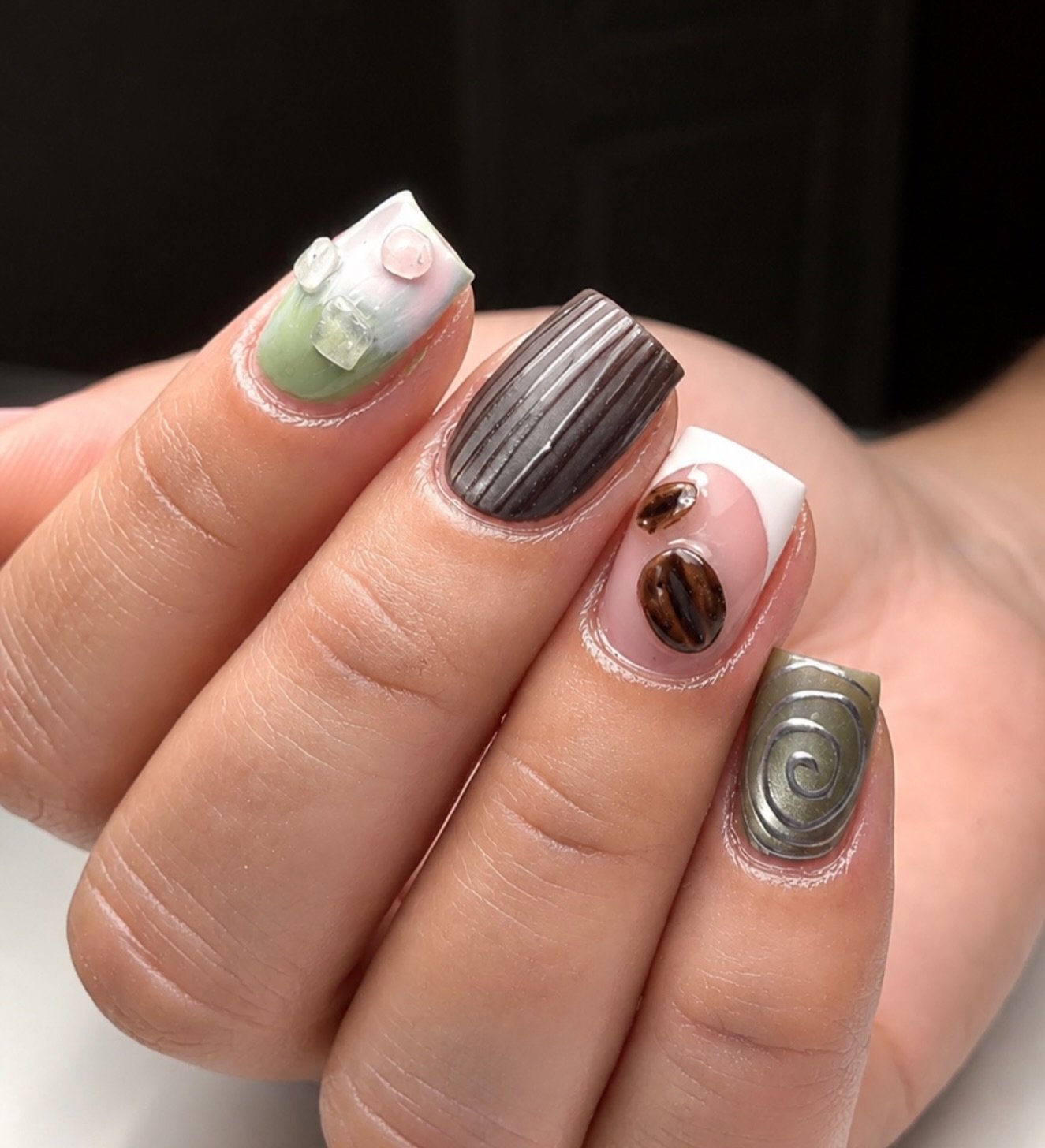 Brown and Pink Nails with Metallic Swirls