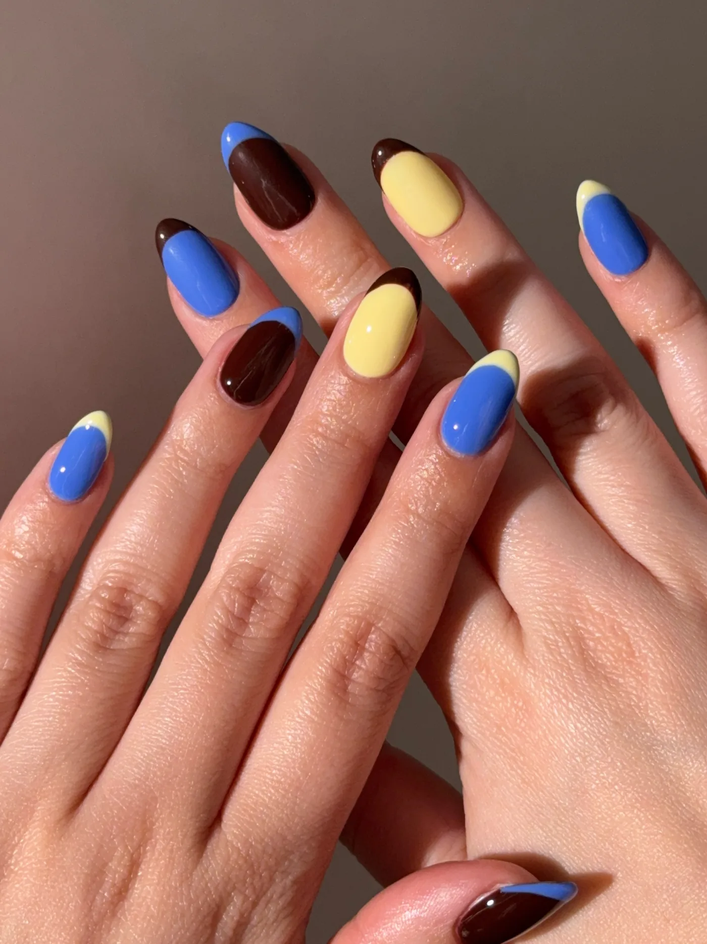 Colorful Almond Nails in Blue, Brown, Yellow, and Orange — DZl7Q5Nmy-nAnahi Victoria.jpg
