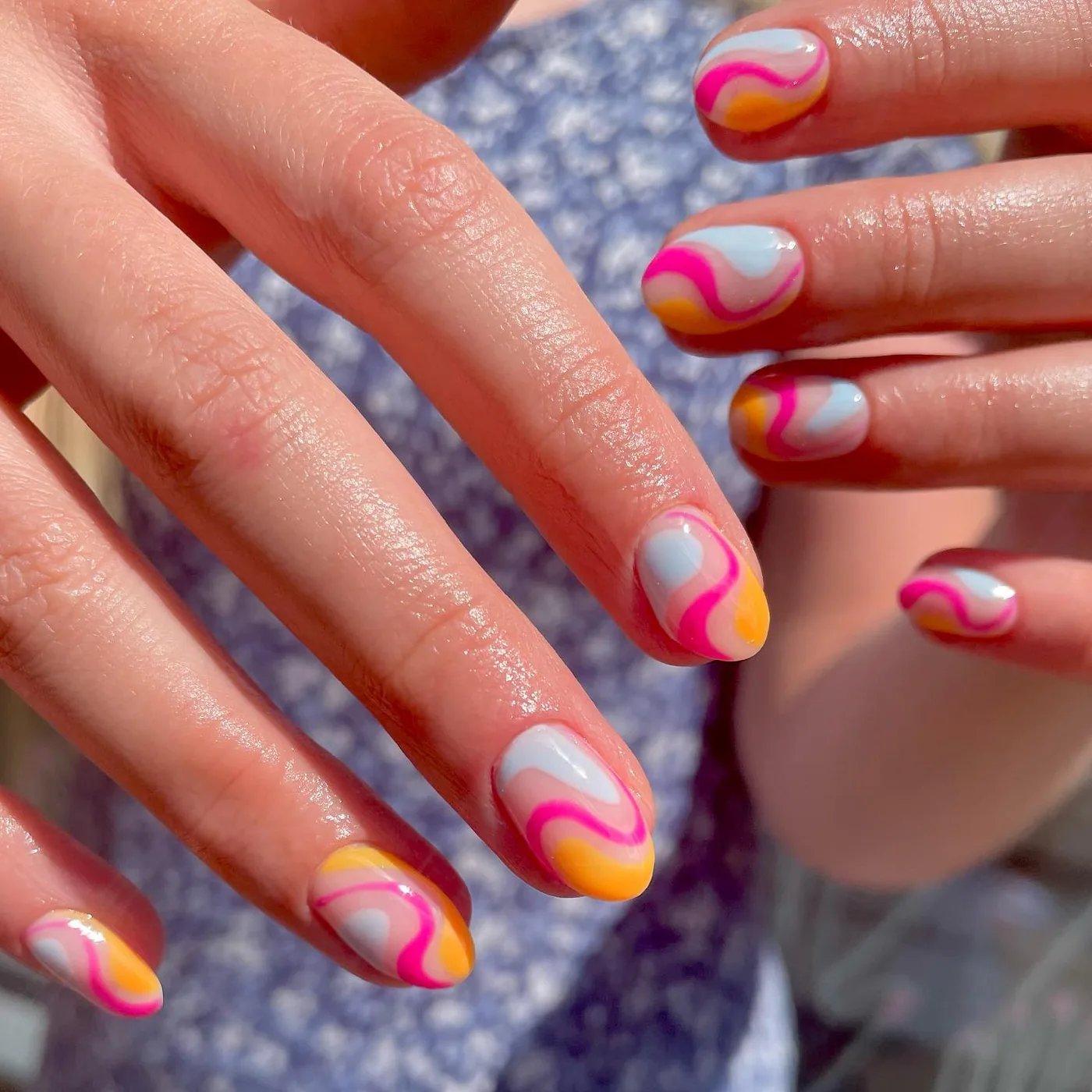 Pink Swirl Accent Nails on a Bright Base — Cf4gtP0sApFNIQUE.jpg