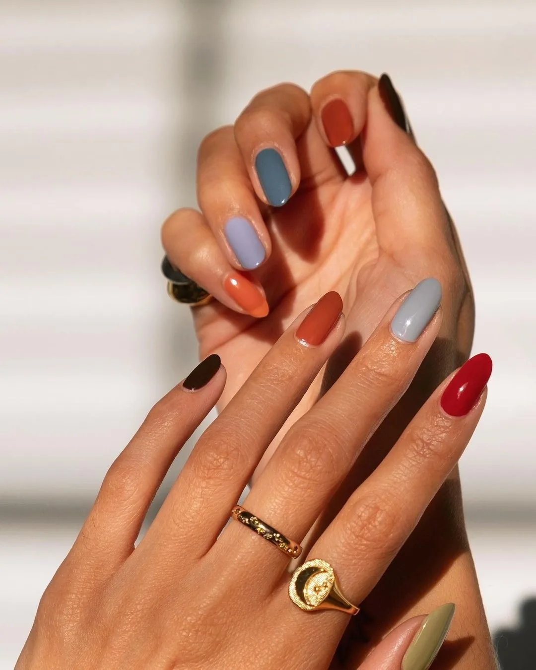 Warm Multicolor Nails with Blue and Red Accents — CI0R8OXMCEOELLE India.jpg
