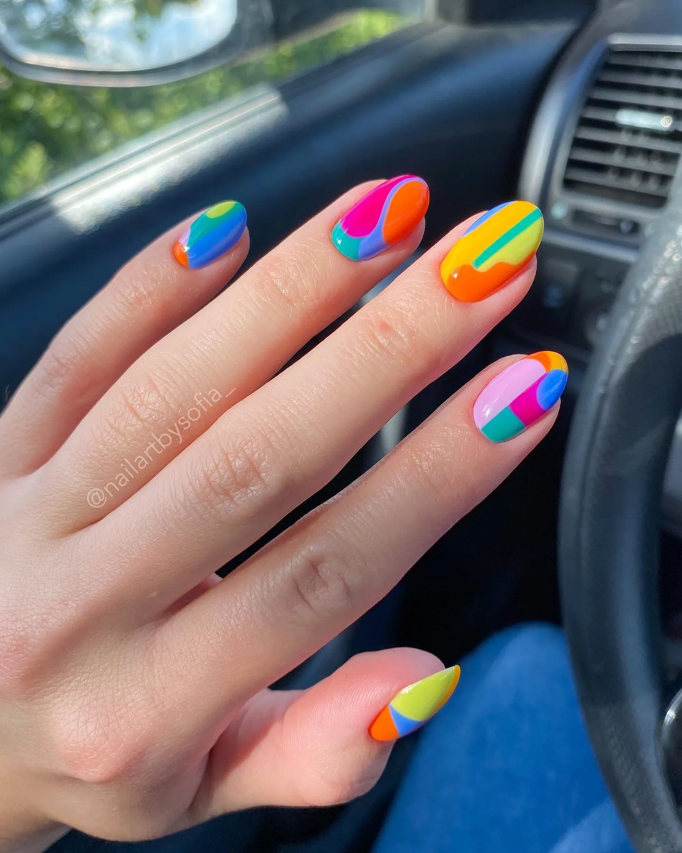 Bright Multicolor Nails with Curved Color Blocks — CteehnDJ6W8Sofía Wood Nail Artist & Instructor.jpg