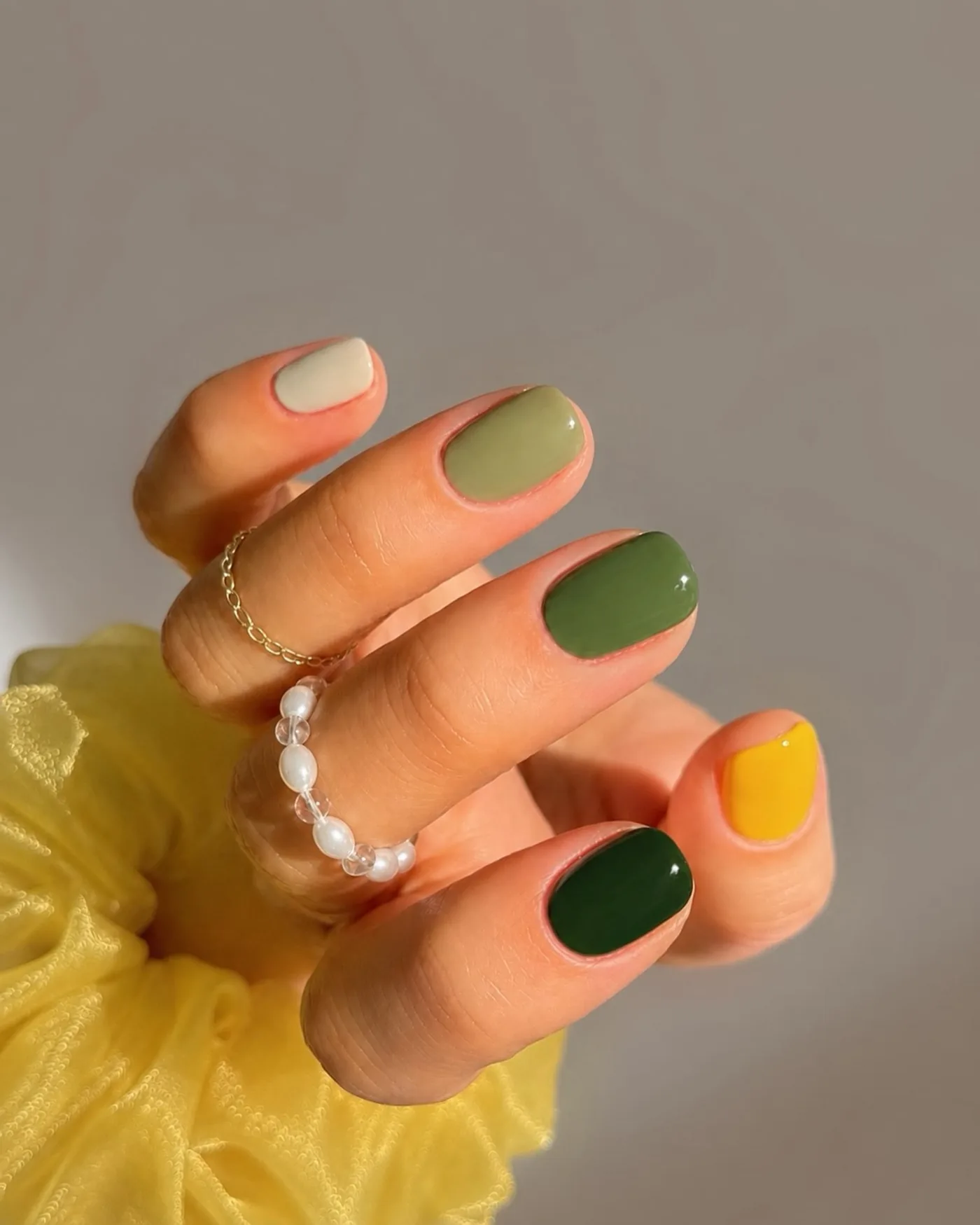 Olive Green Short Nails with Cream and Orange Accents — Dblwl-GhTRoHang Nguyen.jpg