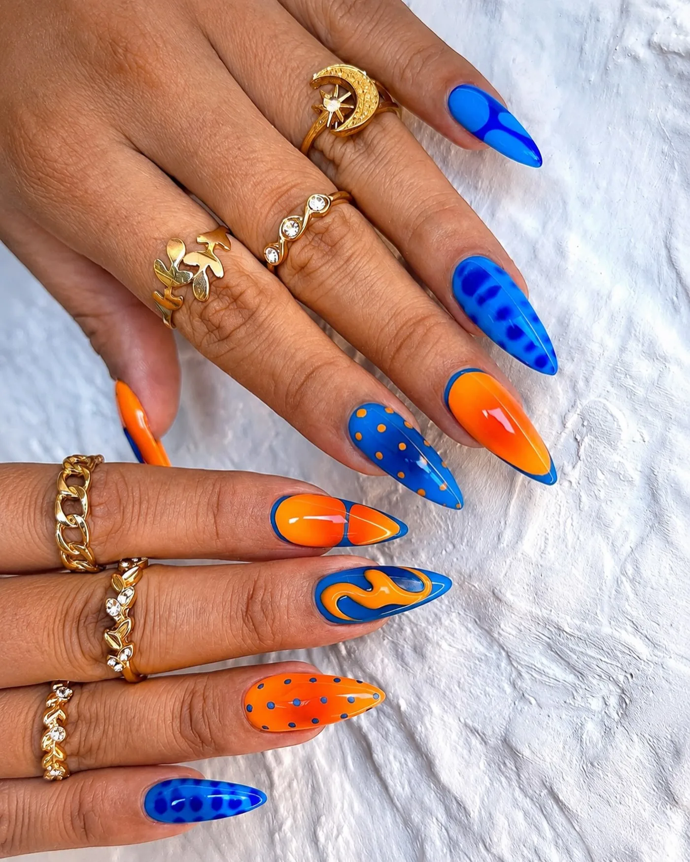 Blue and Orange Long Almond Nails with Graphic Art — DbVq369pStVInspire Nail Bar Severna Park.jpg