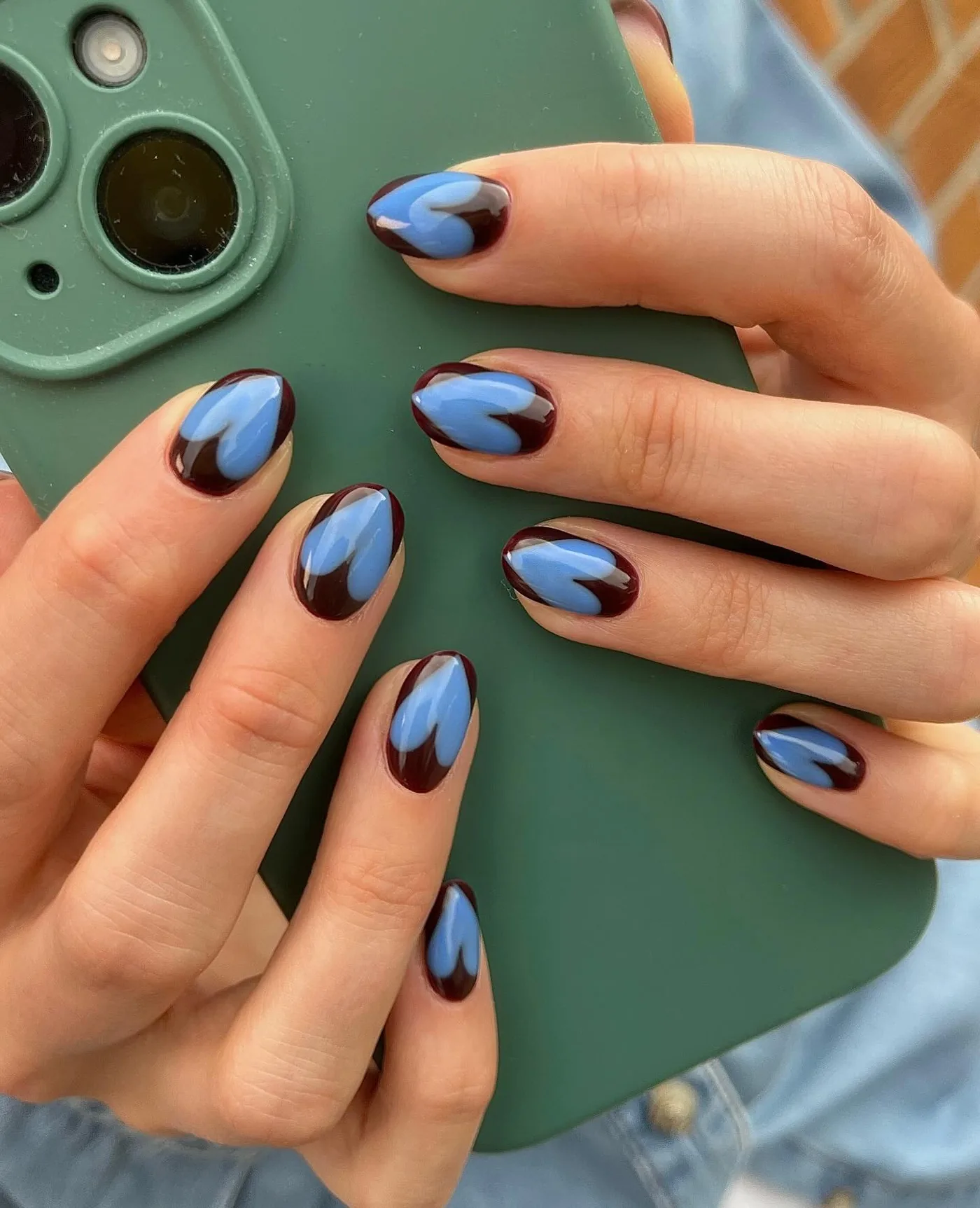 Glossy Blue Almond Nails with Brown Accents — DOB6k9NCF7EHEATHER ERRINGTON.jpg