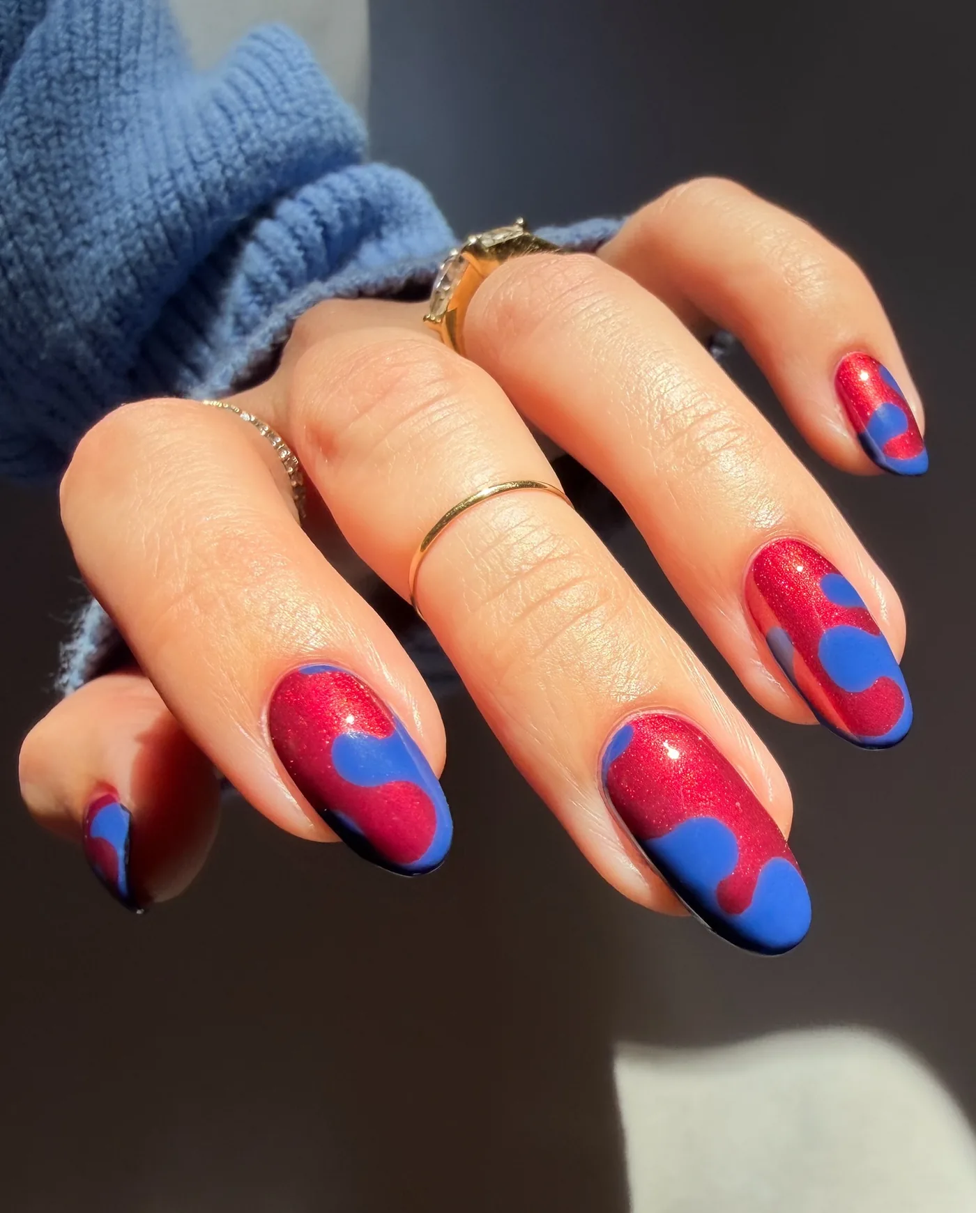 Blue and Red Rounded Nails with Split-Color Tips — DQwfyTdDYAASierra - Nail Polish Nail Art.jpg