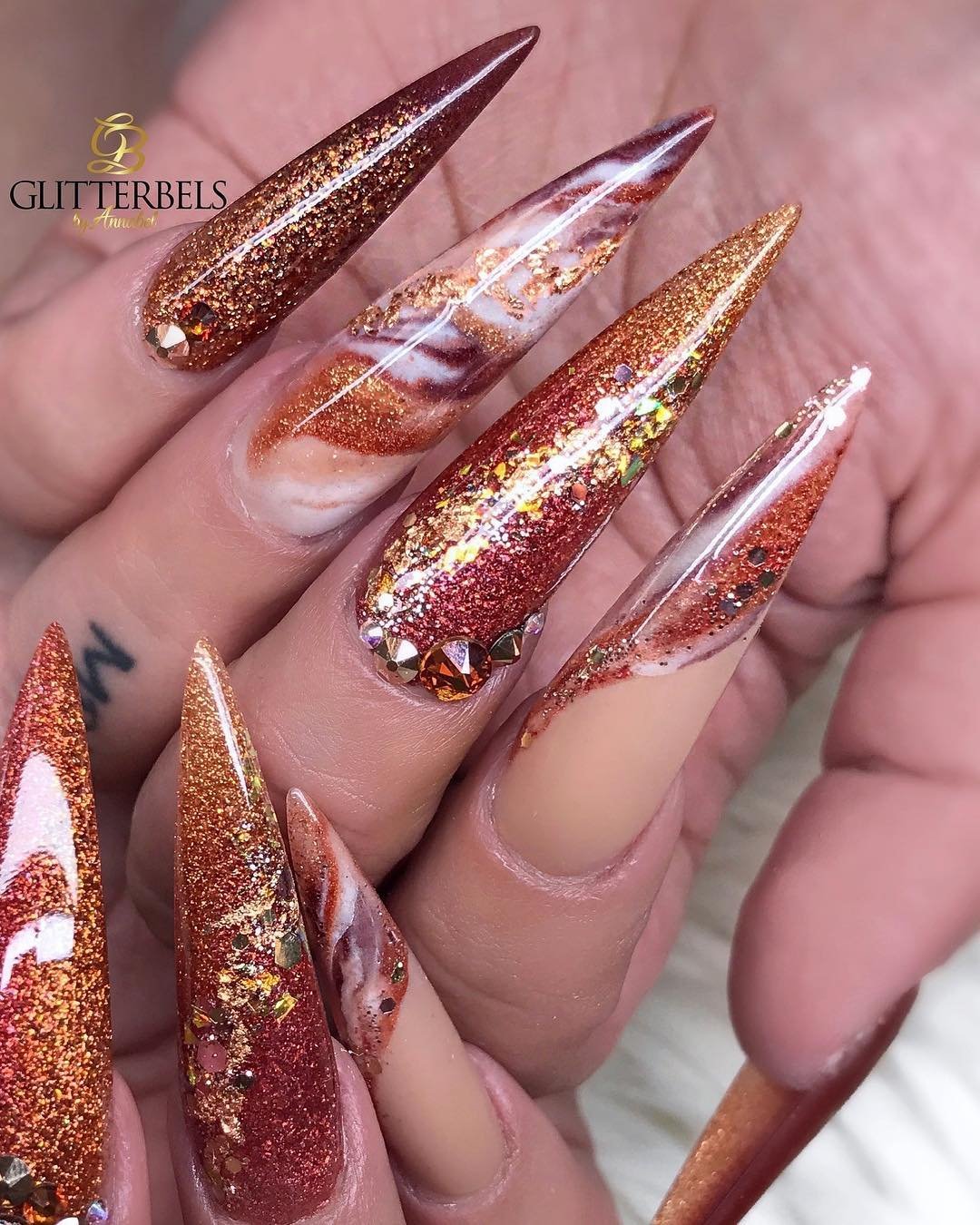 Copper Glitter Stiletto Nails with Marbled Accent Details