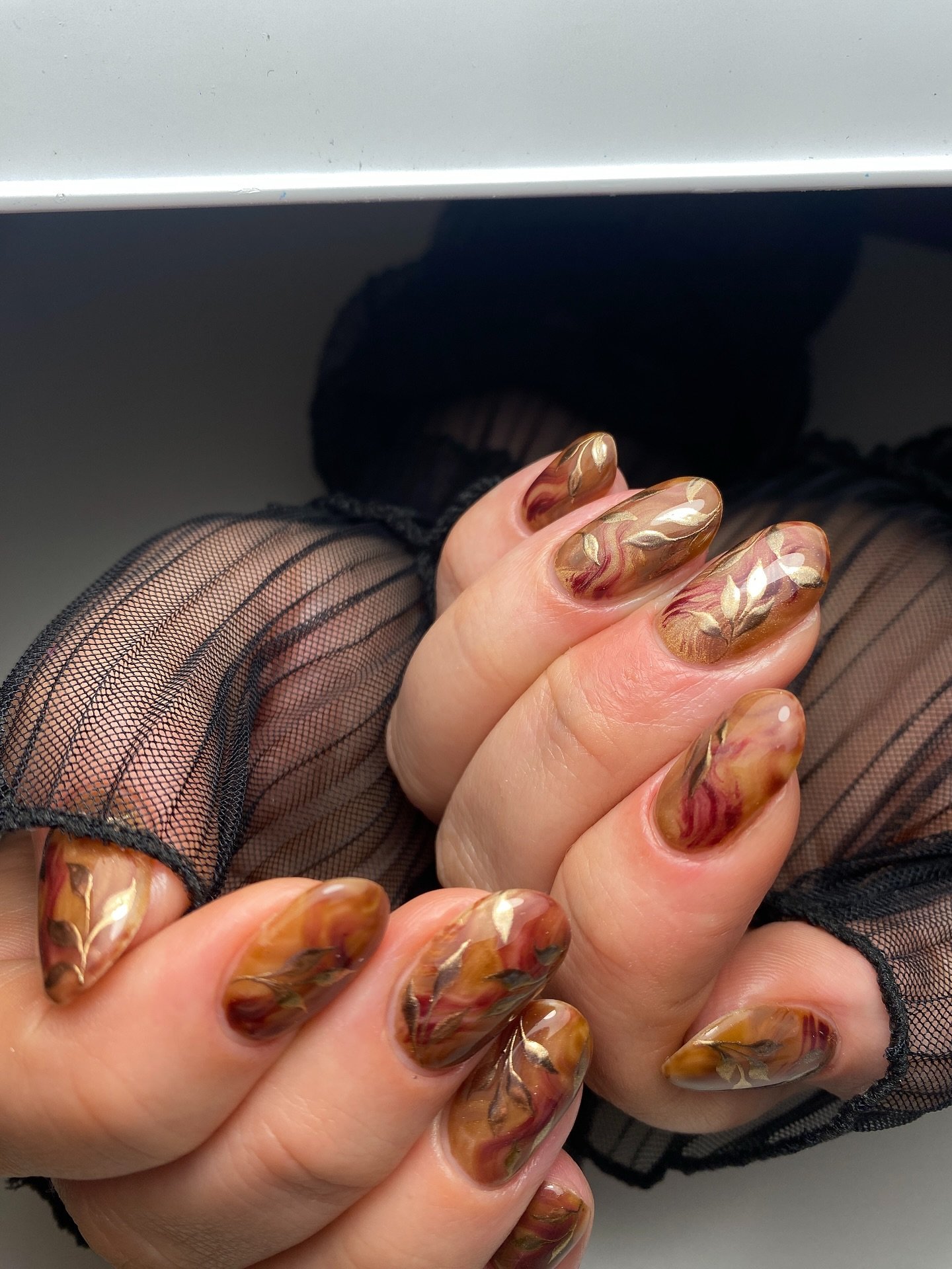 Copper and Brown Almond Nails with Textured Accent Details