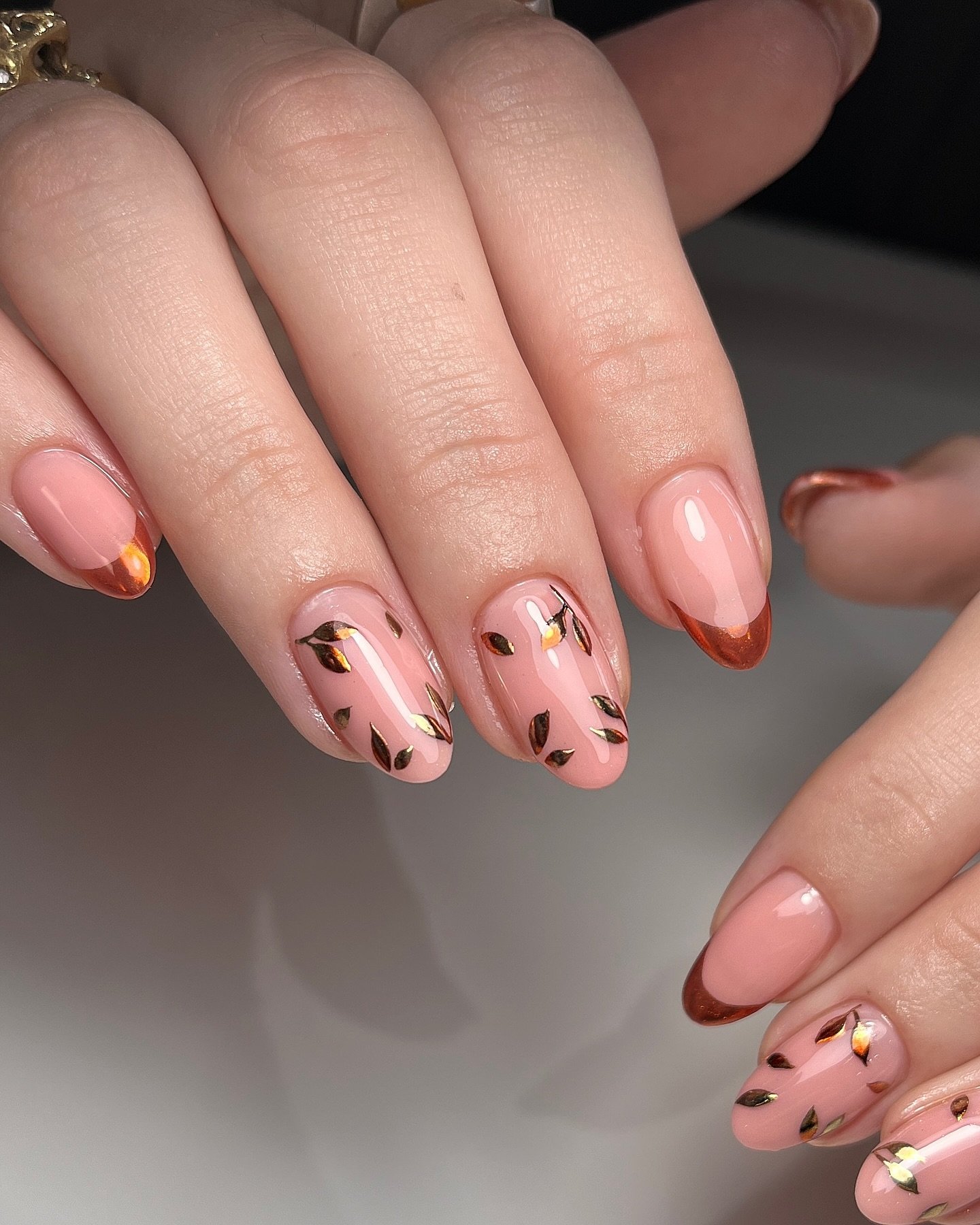 Soft Pink Short Almond Nails with Tiny Copper Details