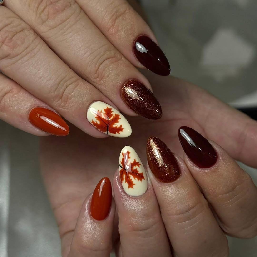 Brown, Rust, and White Almond Nails with Leaf Motifs