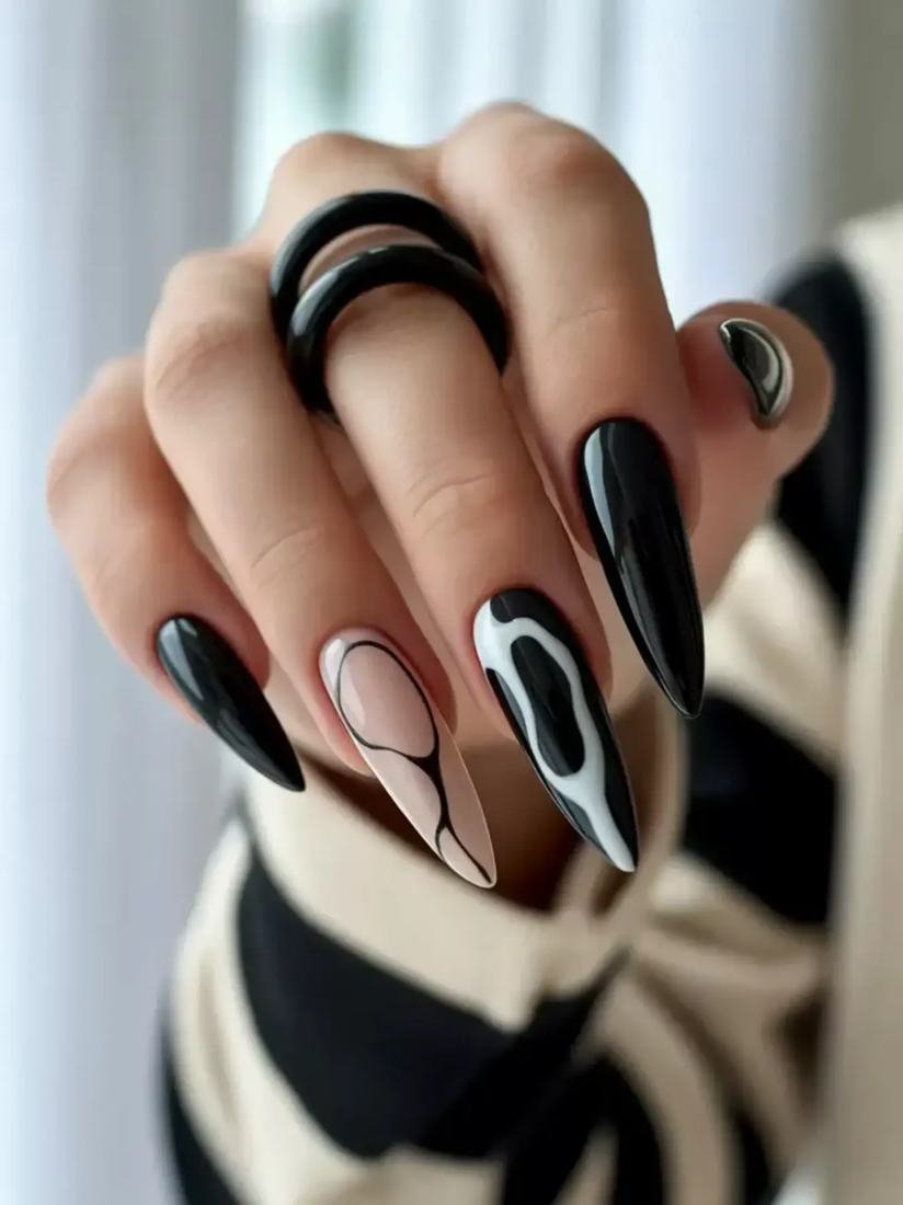 Black Almond Nails with Nude and White Swirl Details