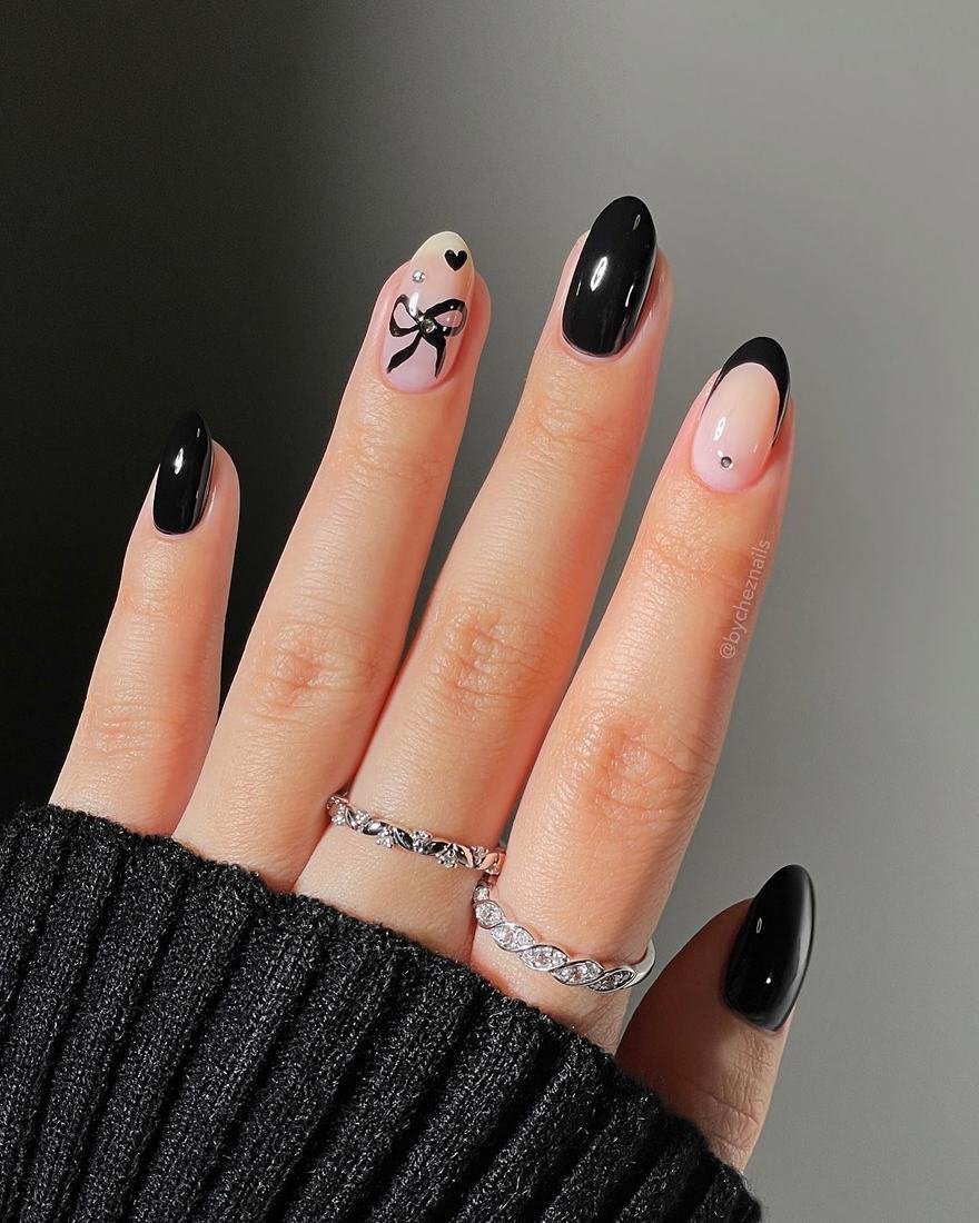 Pink and Black Almond Nails with Small Decorative Details