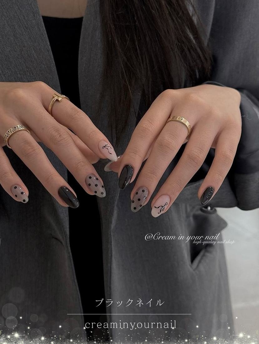 Nude Almond Nails with Dark Abstract Accent Details