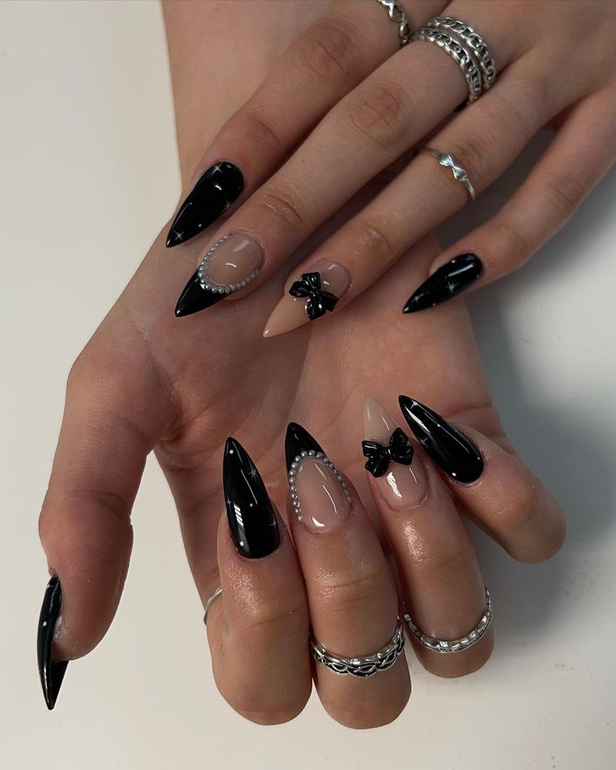 Black Stiletto Nails with Nude and Fine Accent Details