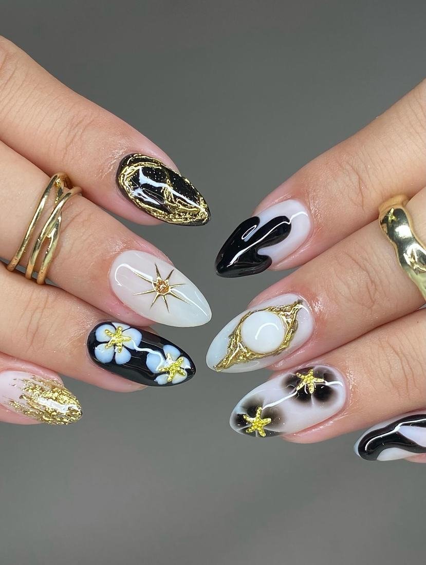 Mixed Black, White, Pink, and Floral Nail Details