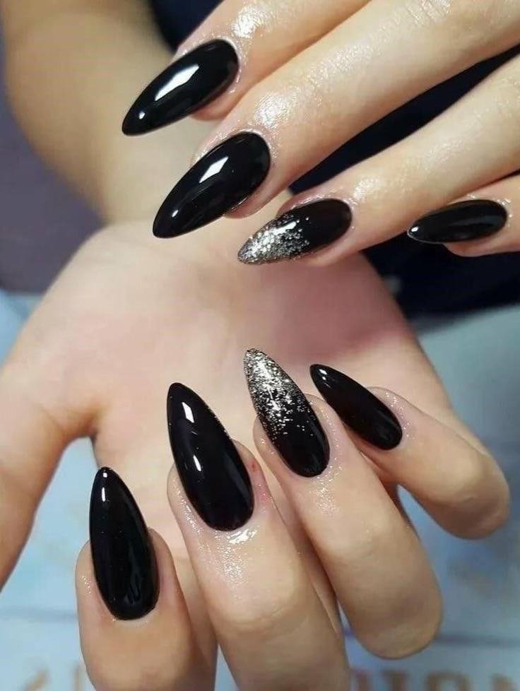 Glossy Black Almond Nails with a Clean Finish