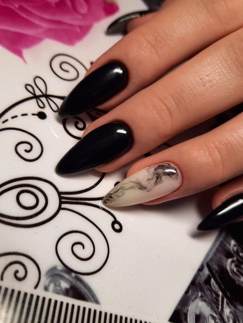 Glossy Black Almond Nails with a Nude Swirl Accent