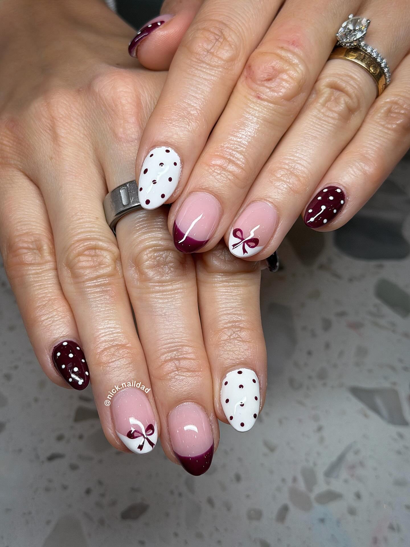 Short Pink and Burgundy Nails with Polka Dots and Bows