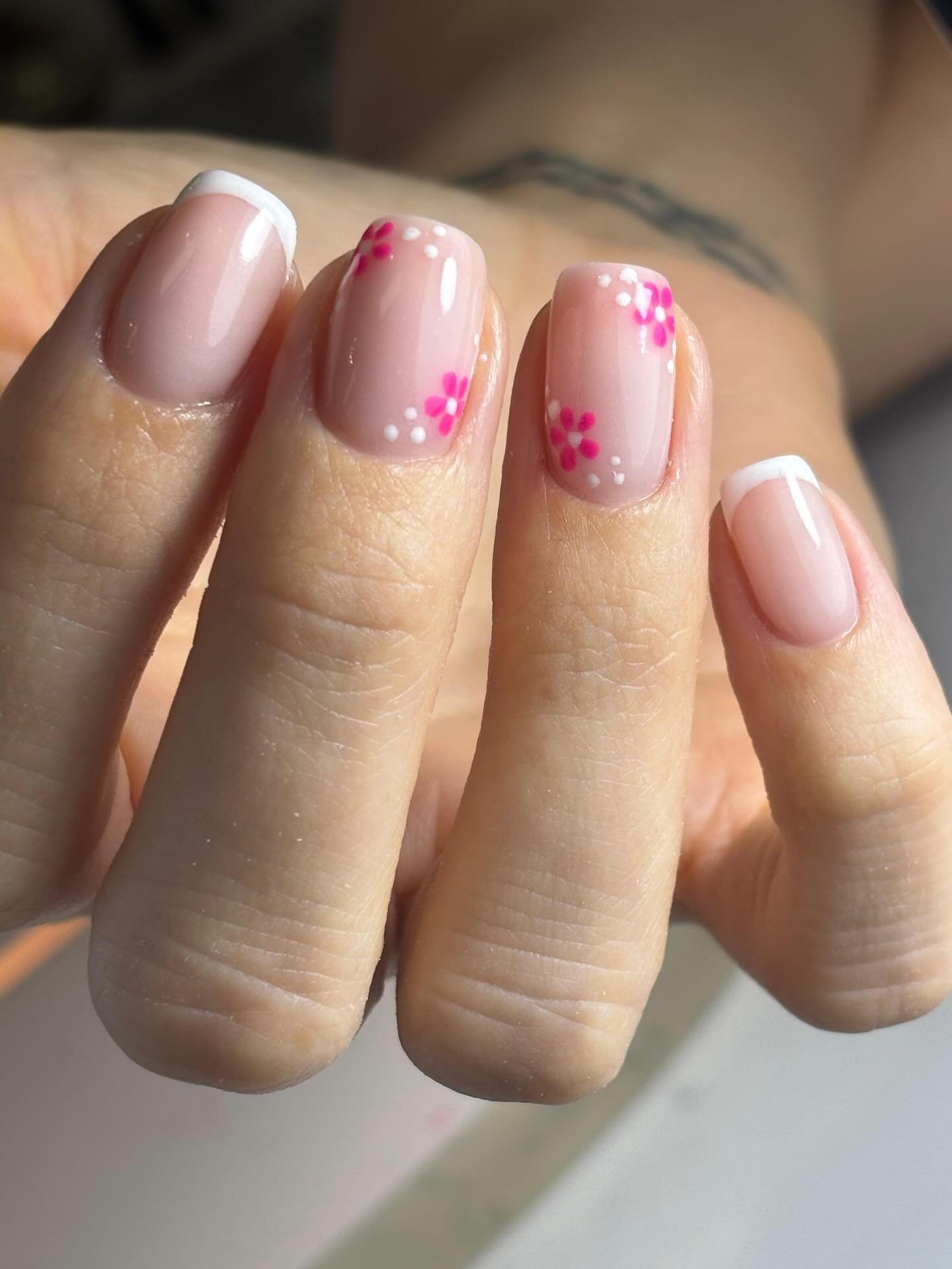 Short Pink Nails with Tiny Pink Flower Accents