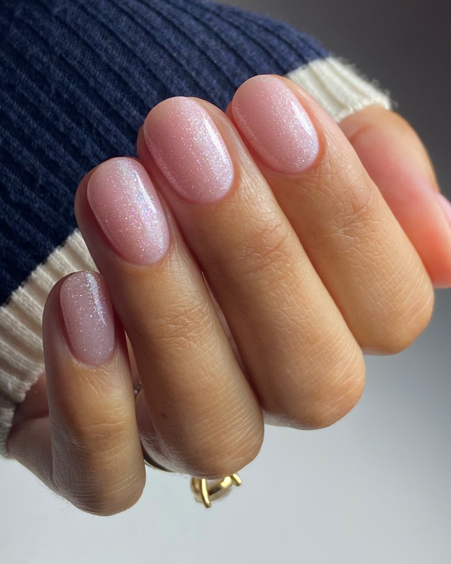 Short Sheer Pink Nails with a Glossy Finish