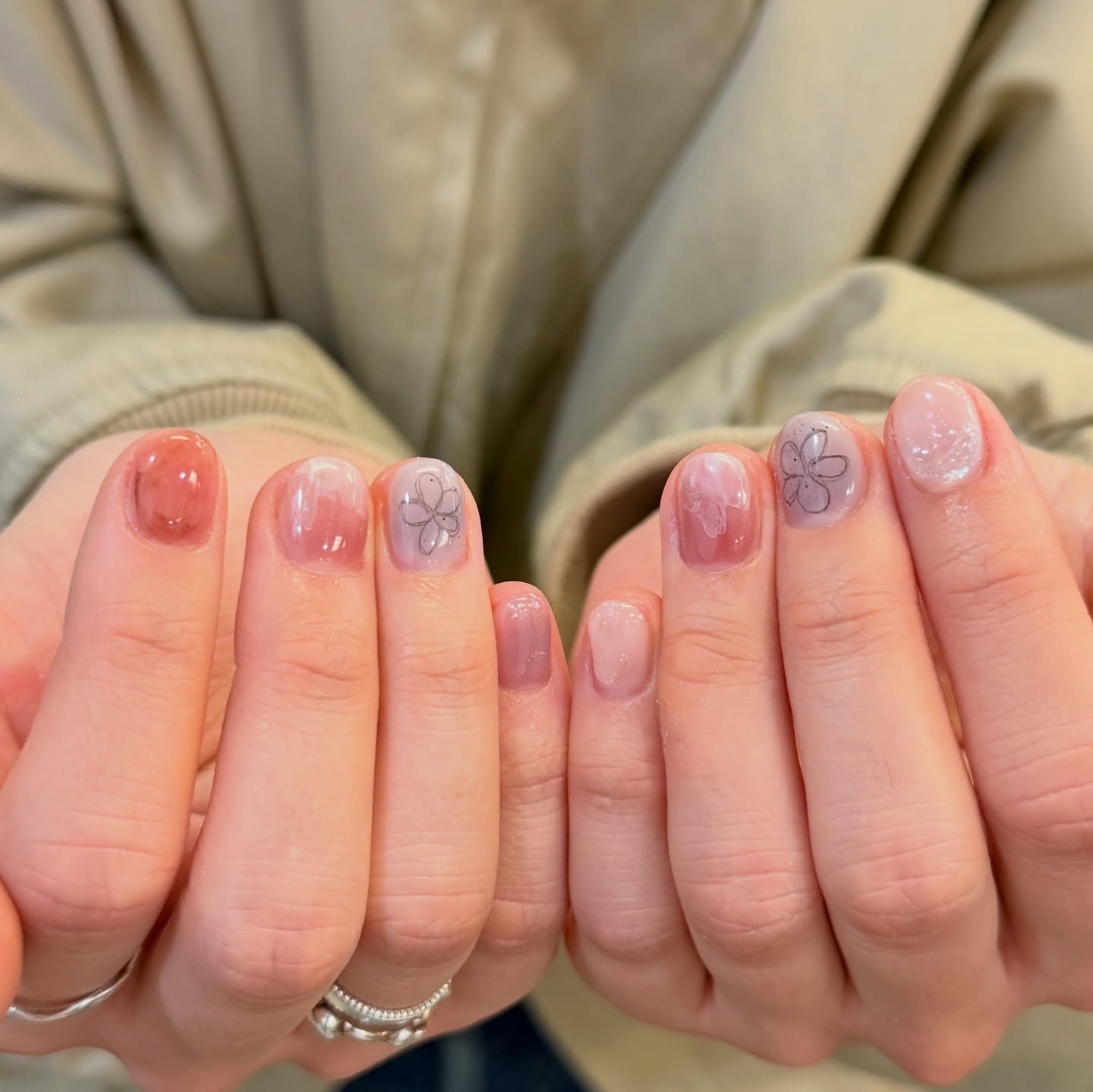 Short Pink Nails with Mixed Pastel Mini Designs