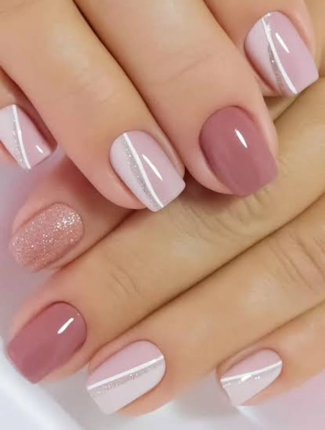 Short Mauve Pink Nails with White Geometric French Tips